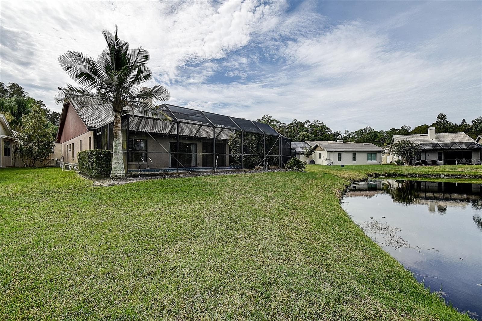 Back Yard is on a Pond - 3609 DARSTON ST, PALM HARBOR