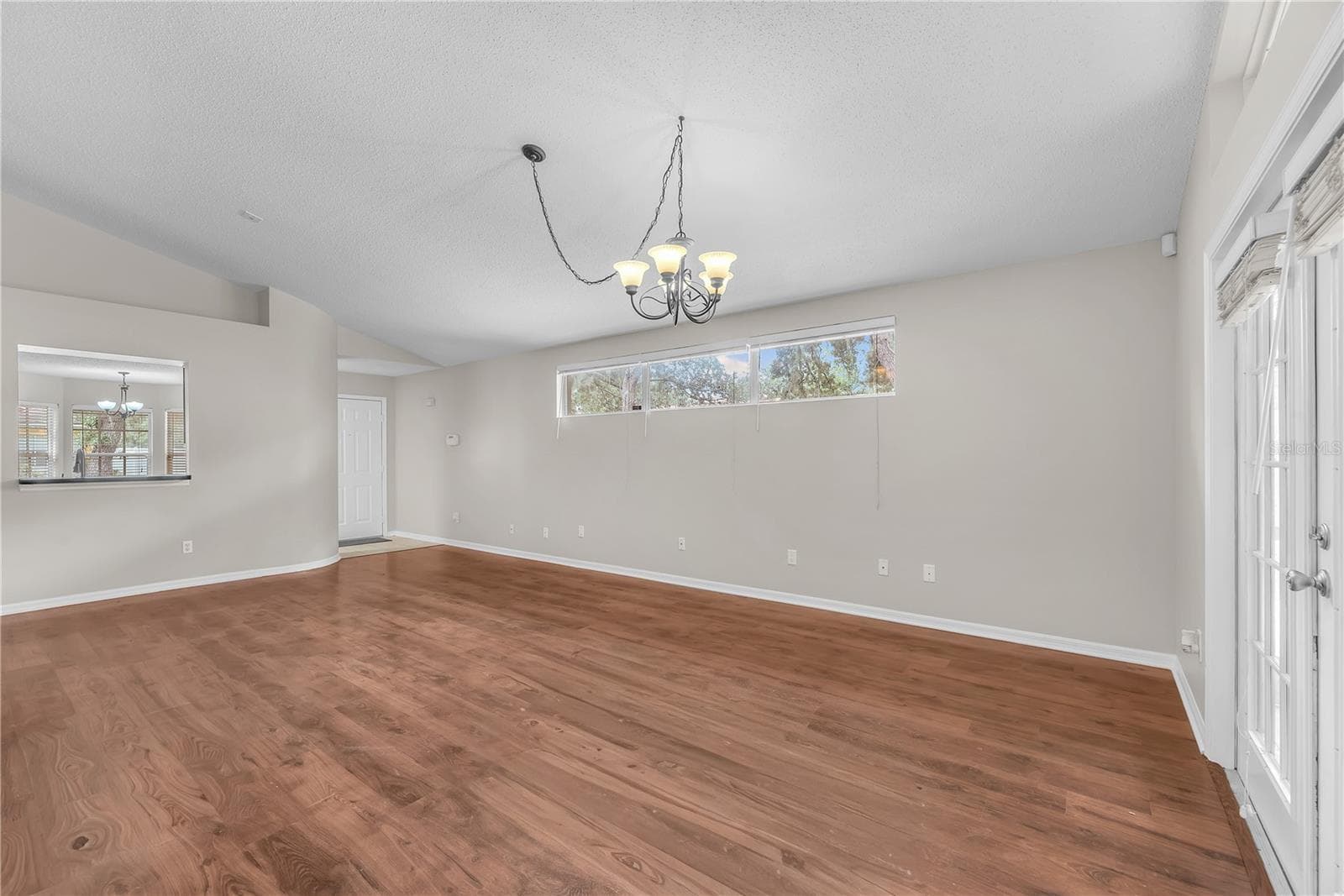 Large transom window lets in natural light. - 4002 LEVONSHIRE PL, VALRICO