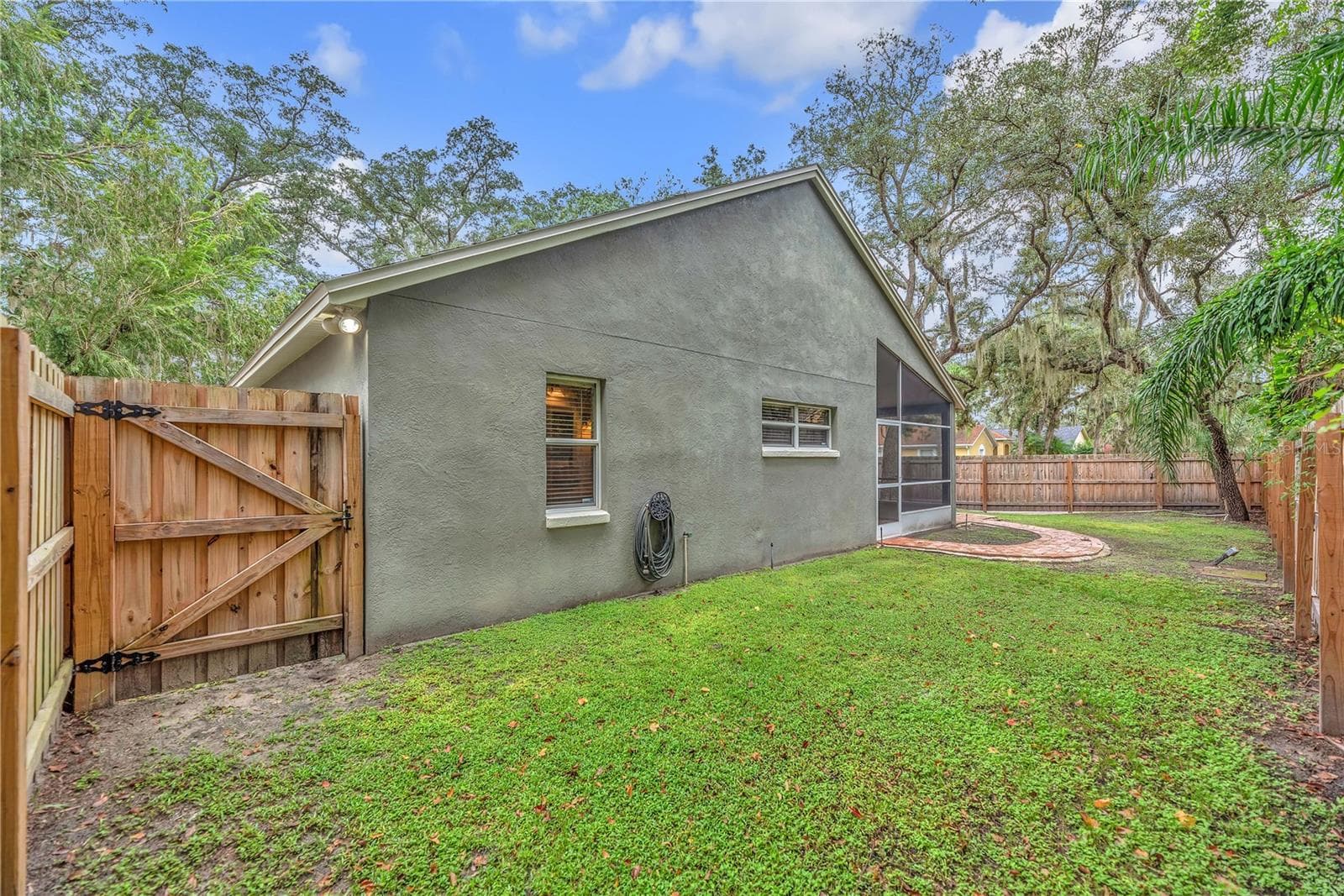 Fenced in backyard for safe play. - 4002 LEVONSHIRE PL, VALRICO