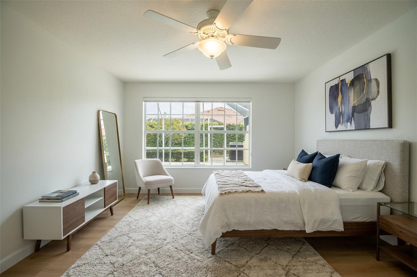 Virtually Staged Primary bedroom. - 8876 ESTEPONA CT, SARASOTA