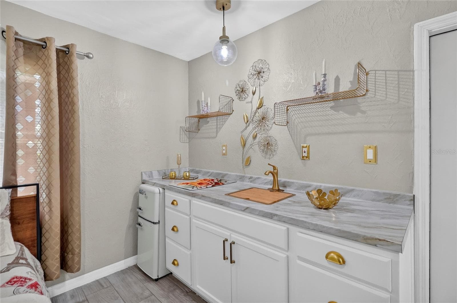 Kitchenette is easily removable. Comes with a sink, electric stovetop, small fridge and microwave - 1075 8TH ST NW, WINTER HAVEN