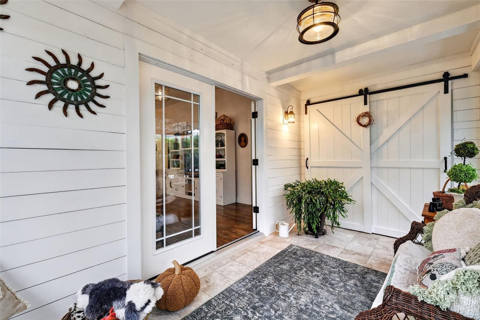 Enclosed Lanai Double French Door to Living Room - 1700 JADESTONE TER, THE VILLAGES