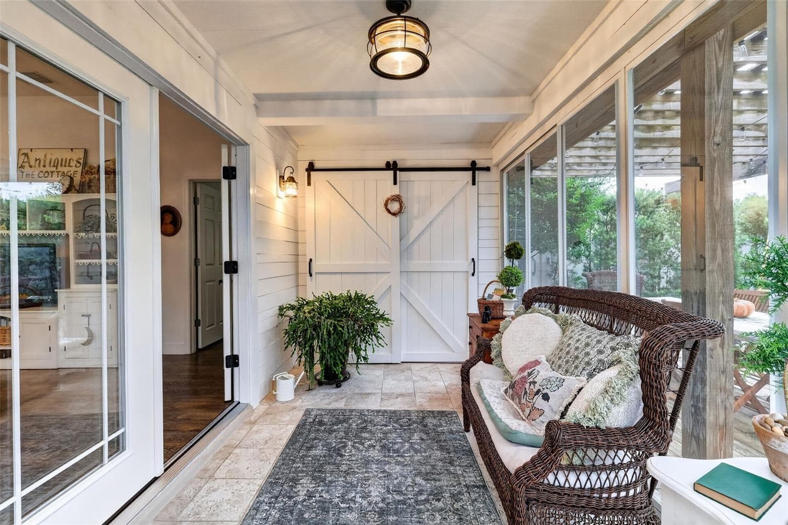 Enclosed Lanai with Barn Door to Sliding Door to Primary Bedroom - 1700 JADESTONE TER, THE VILLAGES