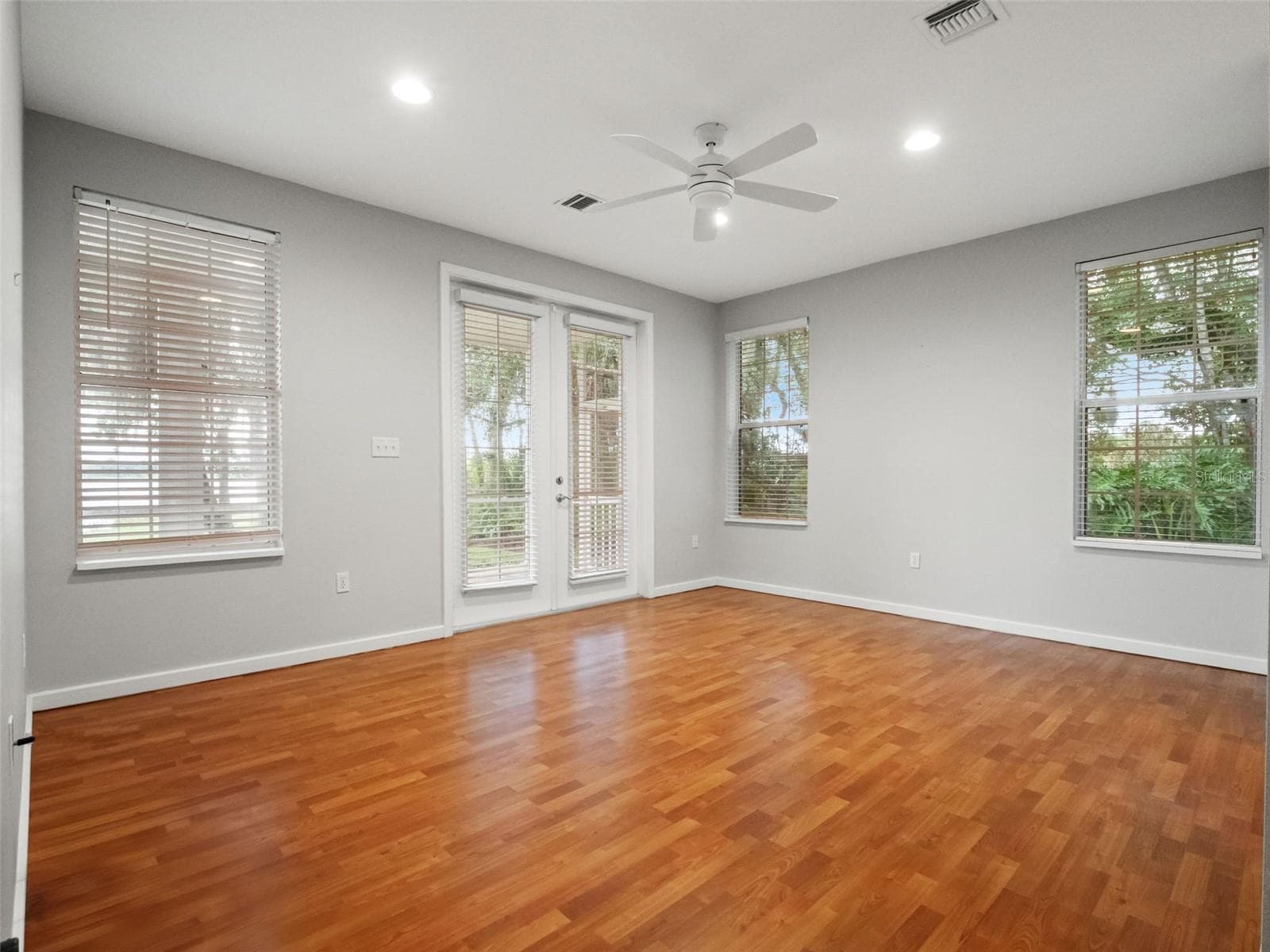 Primary bedroom downstairs - 7751 SADLER RD, MOUNT DORA