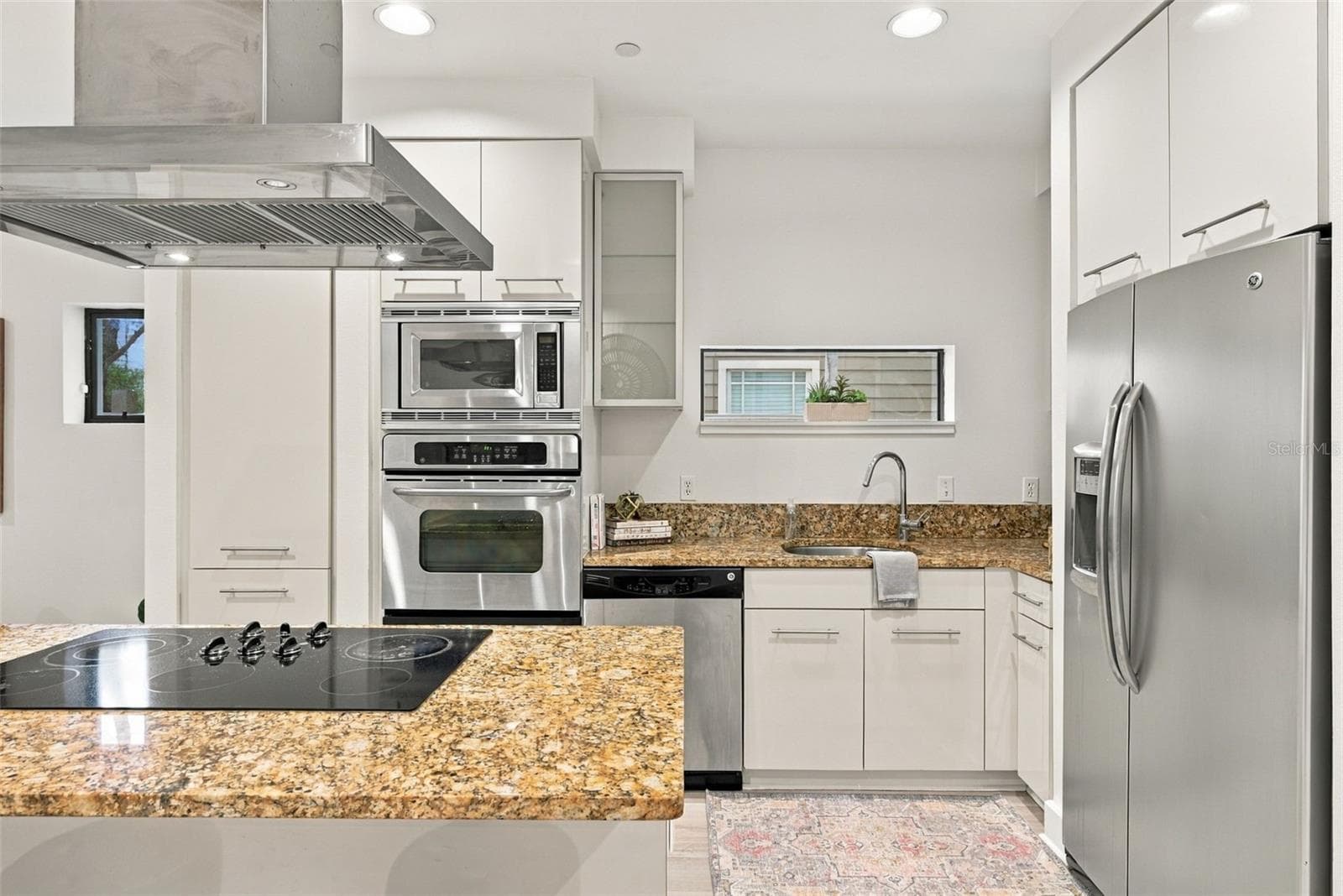 Kitchen features European cabinetry, - 213 S MOODY AVE #1, TAMPA
