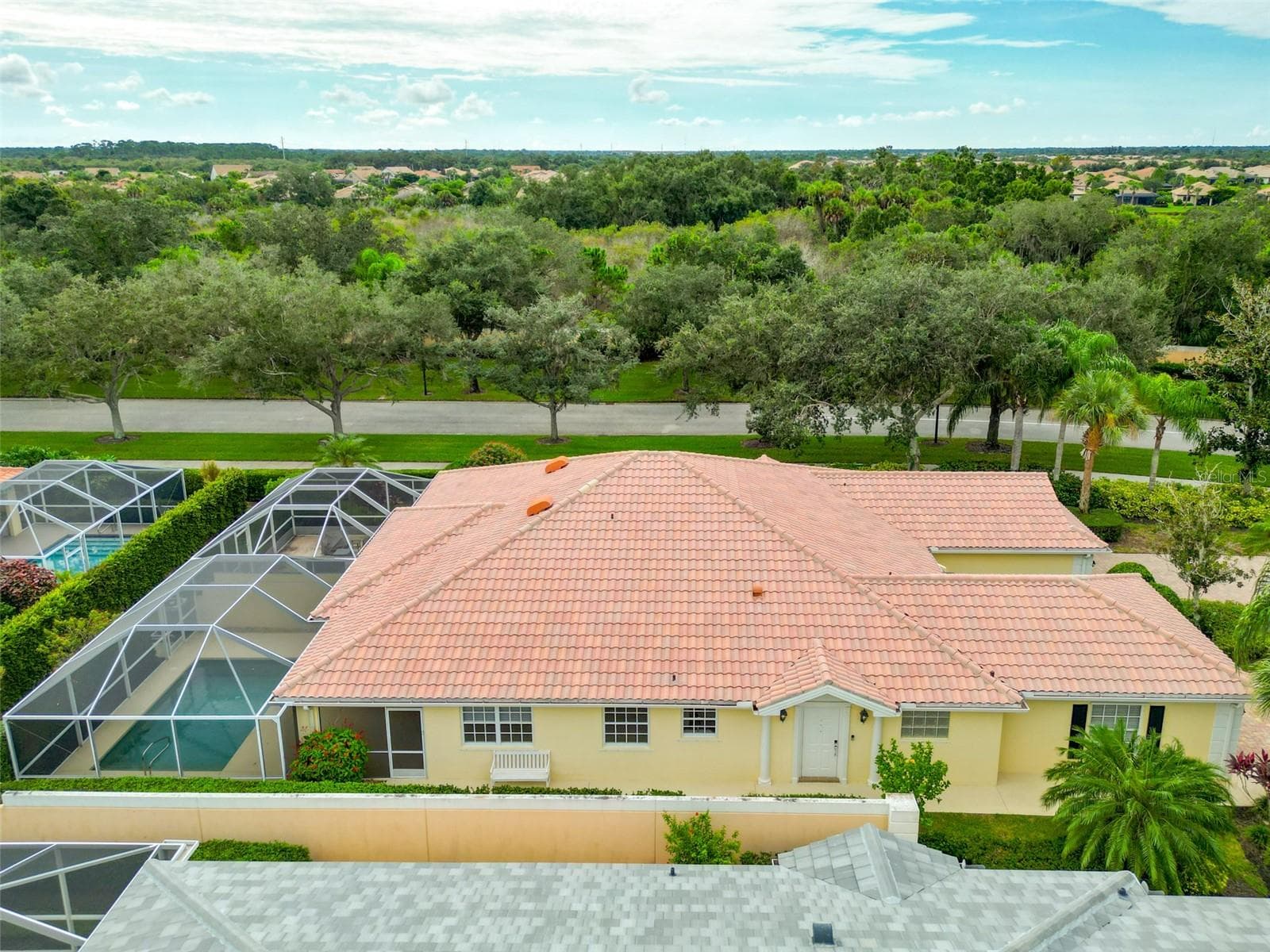 Overhead view of side of home with walk way to front door and pool area. - 8876 ESTEPONA CT, SARASOTA