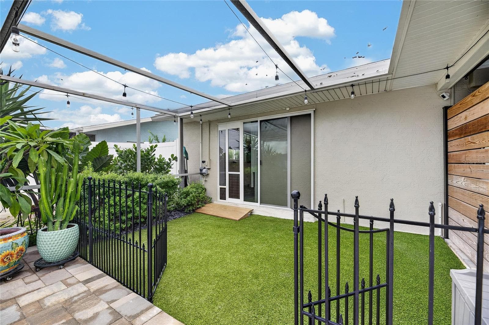 Let The Pups Out Right Here Before Bed! 16' x 10' Pet Potty Run With Pet-Turf & Engineered Drainage System! - 6510 SOLITAIRE PALM WAY, APOLLO BEACH
