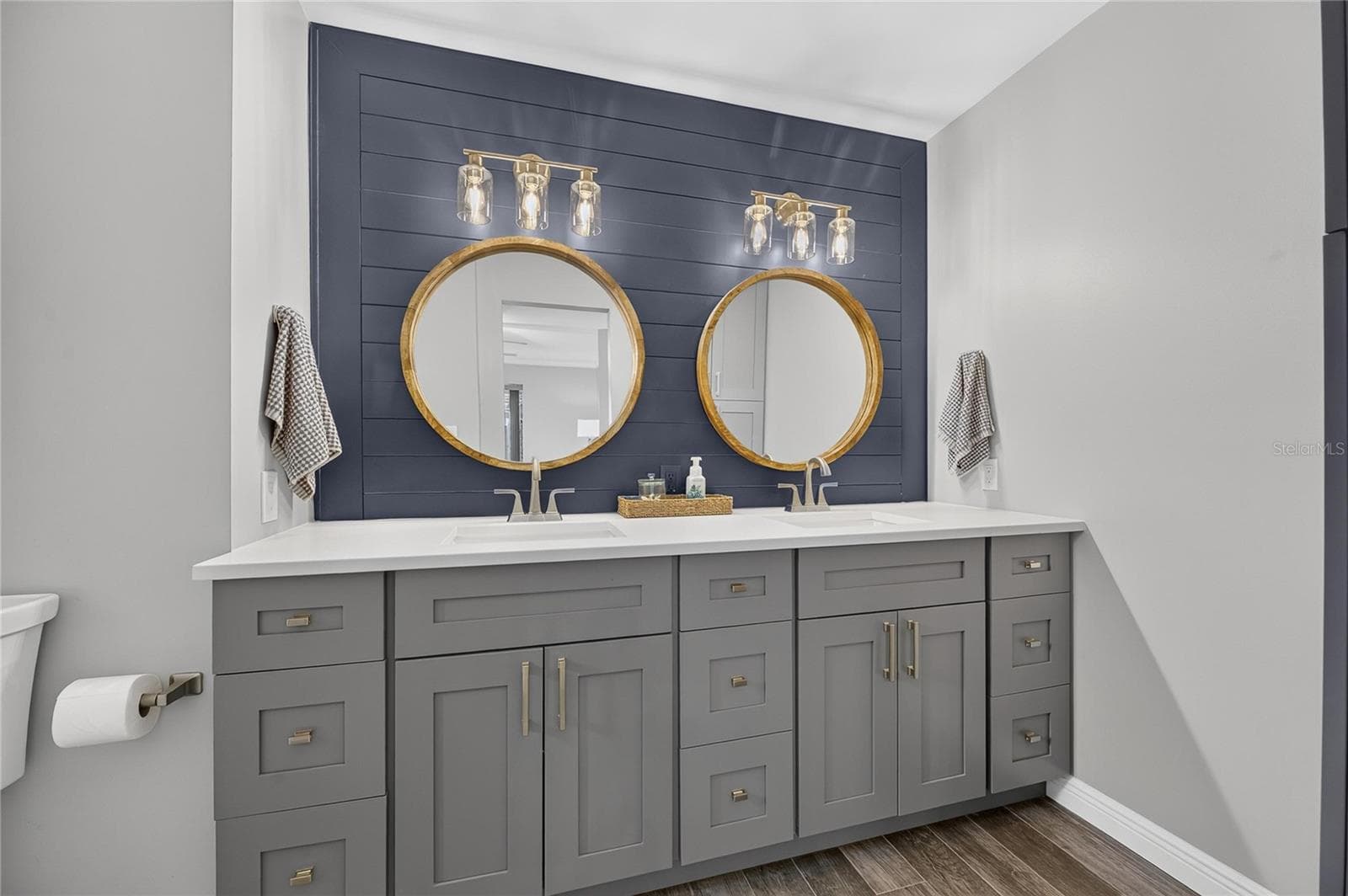 Step Into The Owner's Ensuite Bath!! Extended Height Vanity, Dual Sinks, And Decorative Shiplap & Mirrors! - 6510 SOLITAIRE PALM WAY, APOLLO BEACH