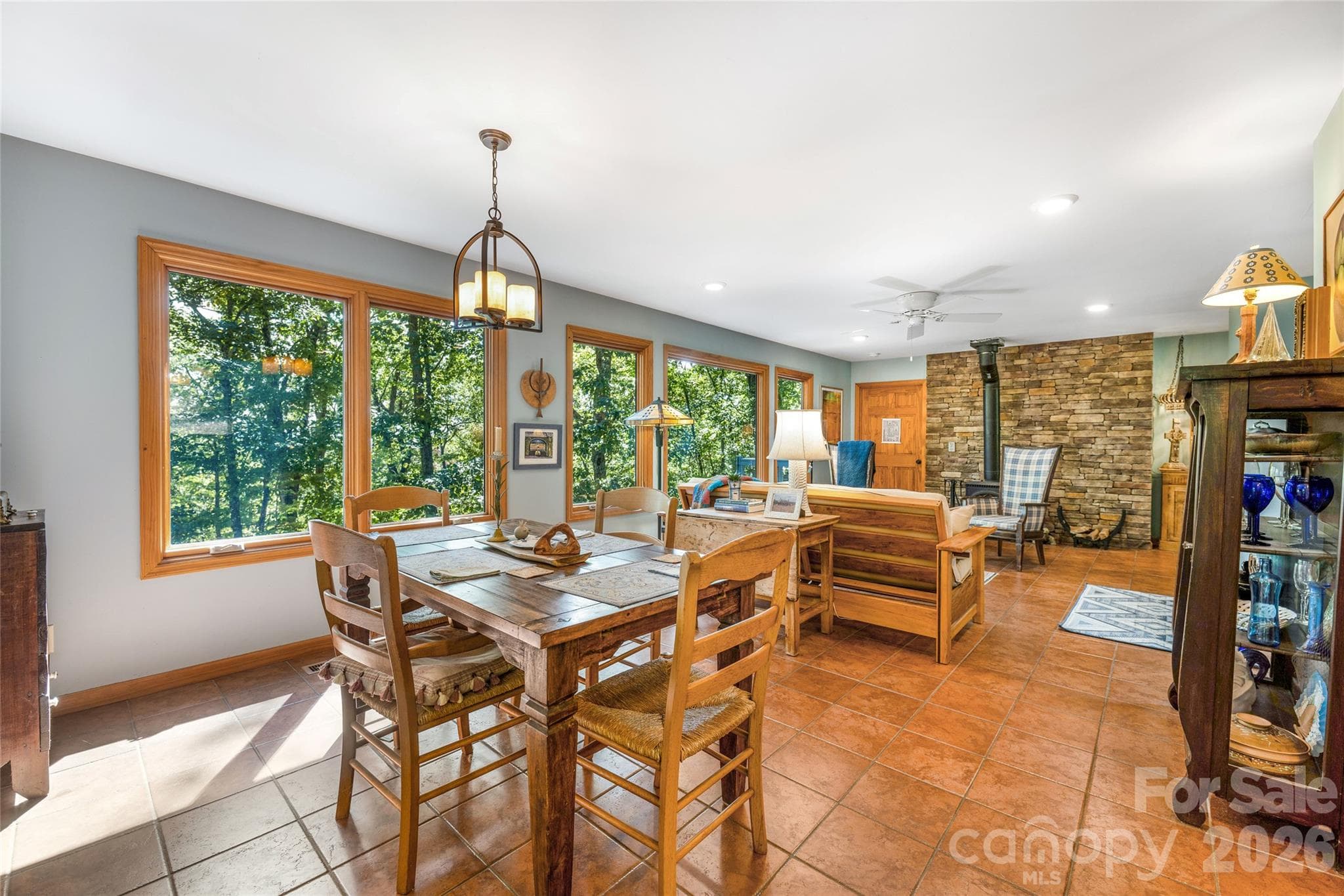 Dining area opens into the living room. - 115 Laurel Wood Drive, Mars Hill