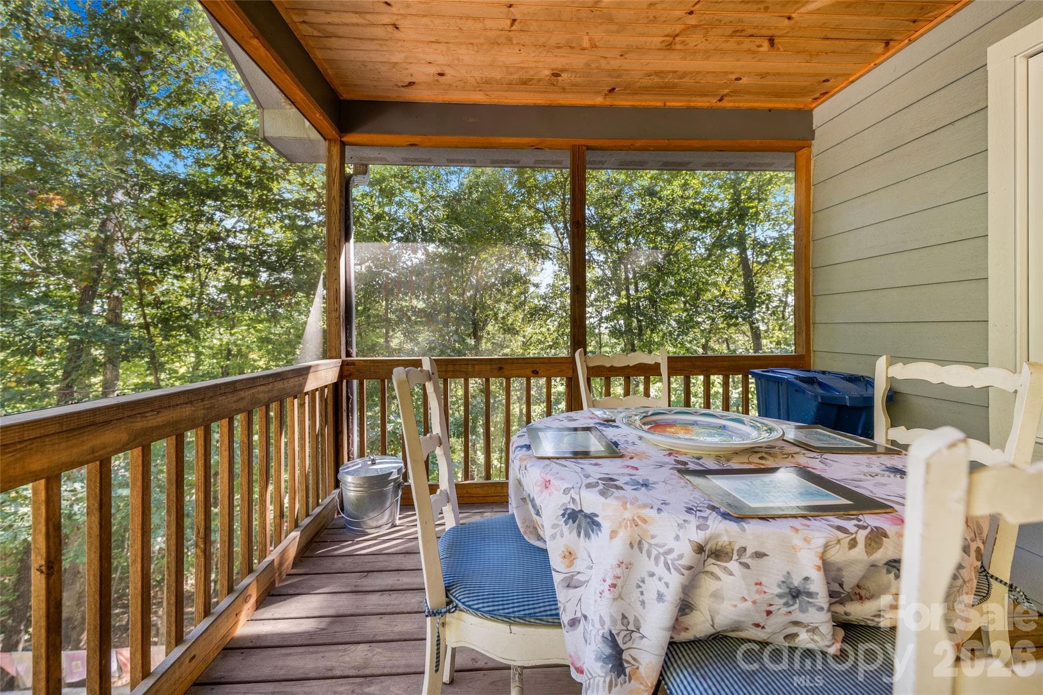 Screened in porch off kitchen. - 115 Laurel Wood Drive, Mars Hill