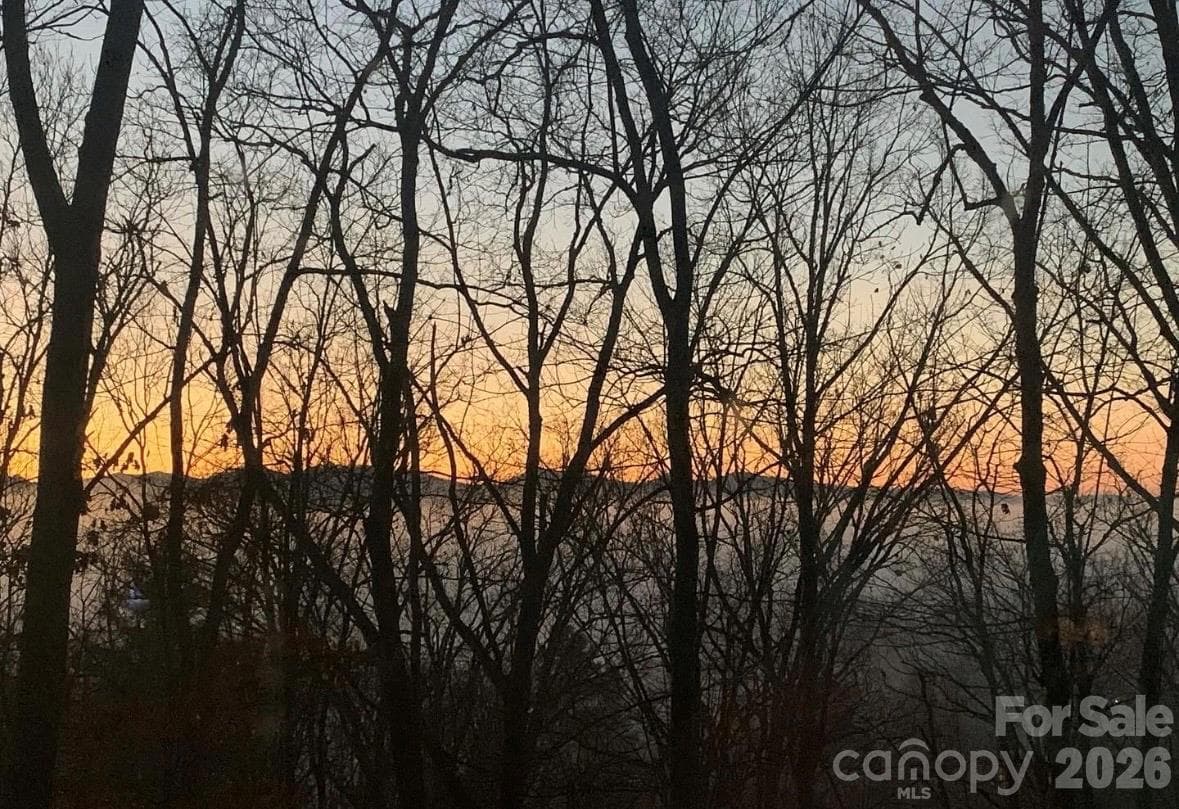 Another winter sunset from the living room. - 115 Laurel Wood Drive, Mars Hill