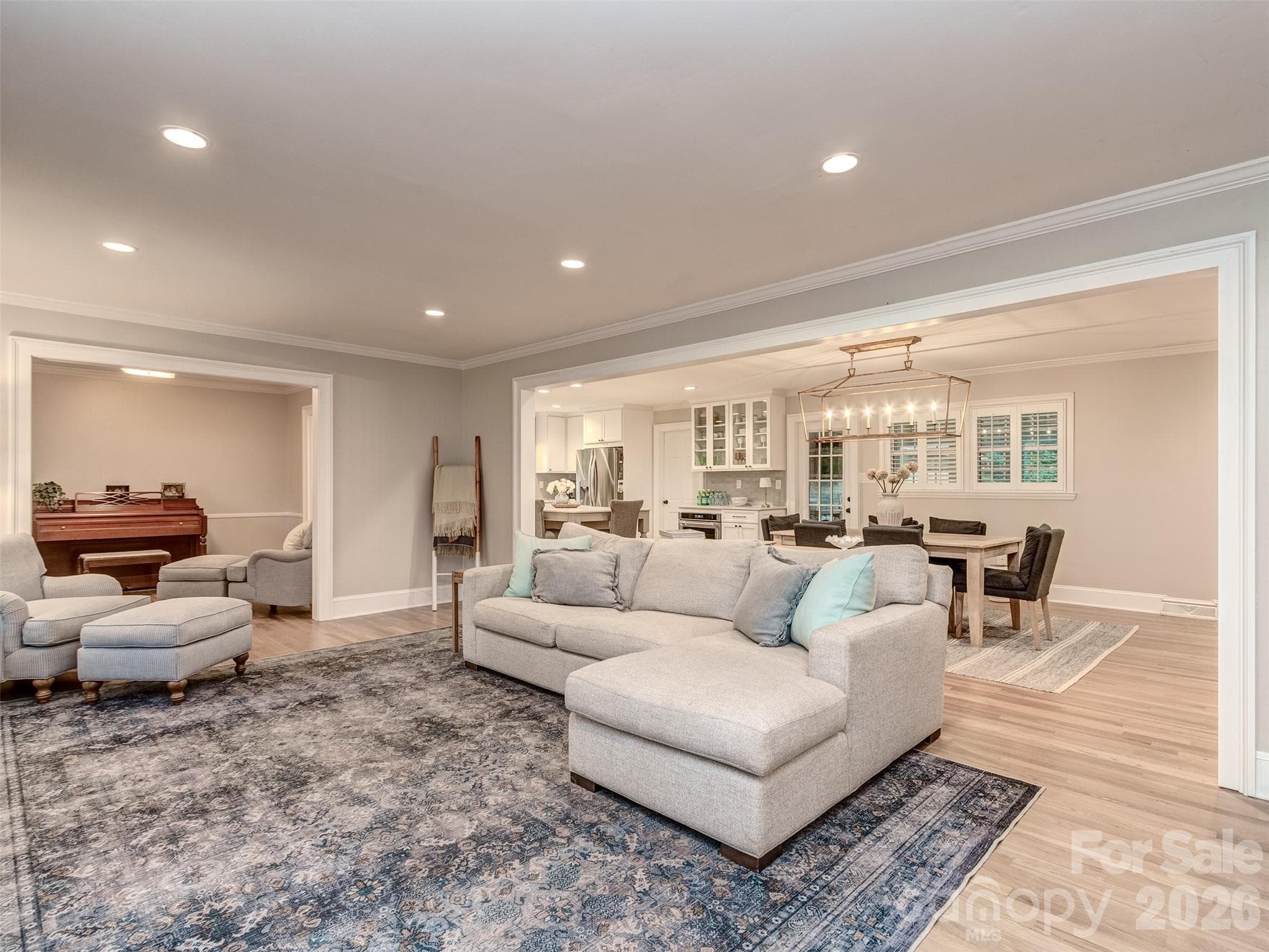 The dramatically open floorplan is perfect for entertaining and not typical to the era of design! - 6129 Page Court, Charlotte