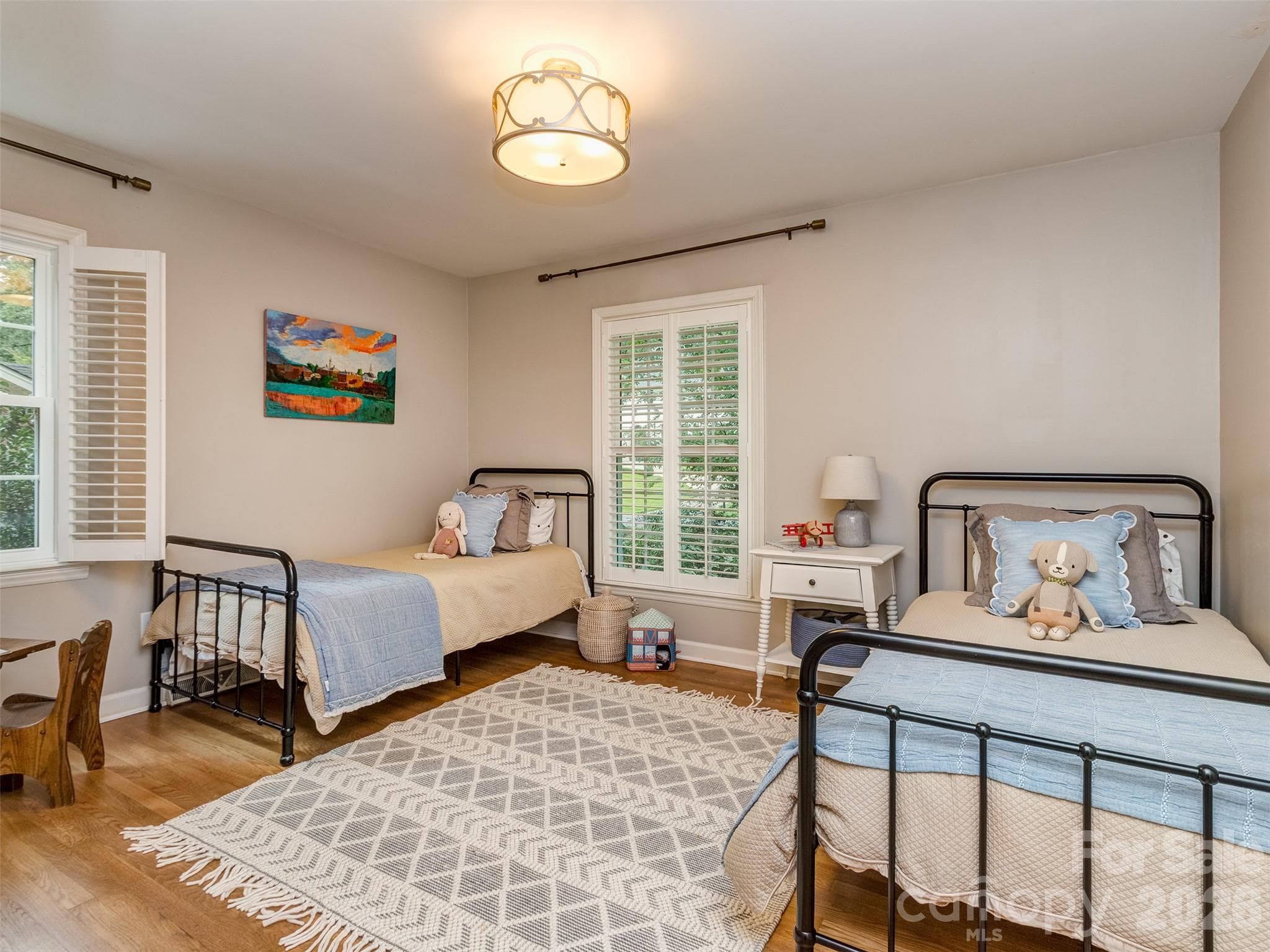The guest rooms are all very spacious, have updated light fixtures, custom blinds, and site finished hardwood floors. - 6129 Page Court, Charlotte
