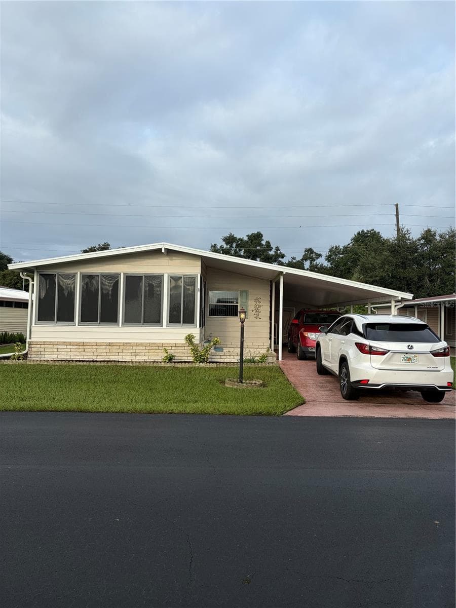 Manufactured Home at 193 E SWEET CIR, WINTER HAVEN, photo 2 of 19