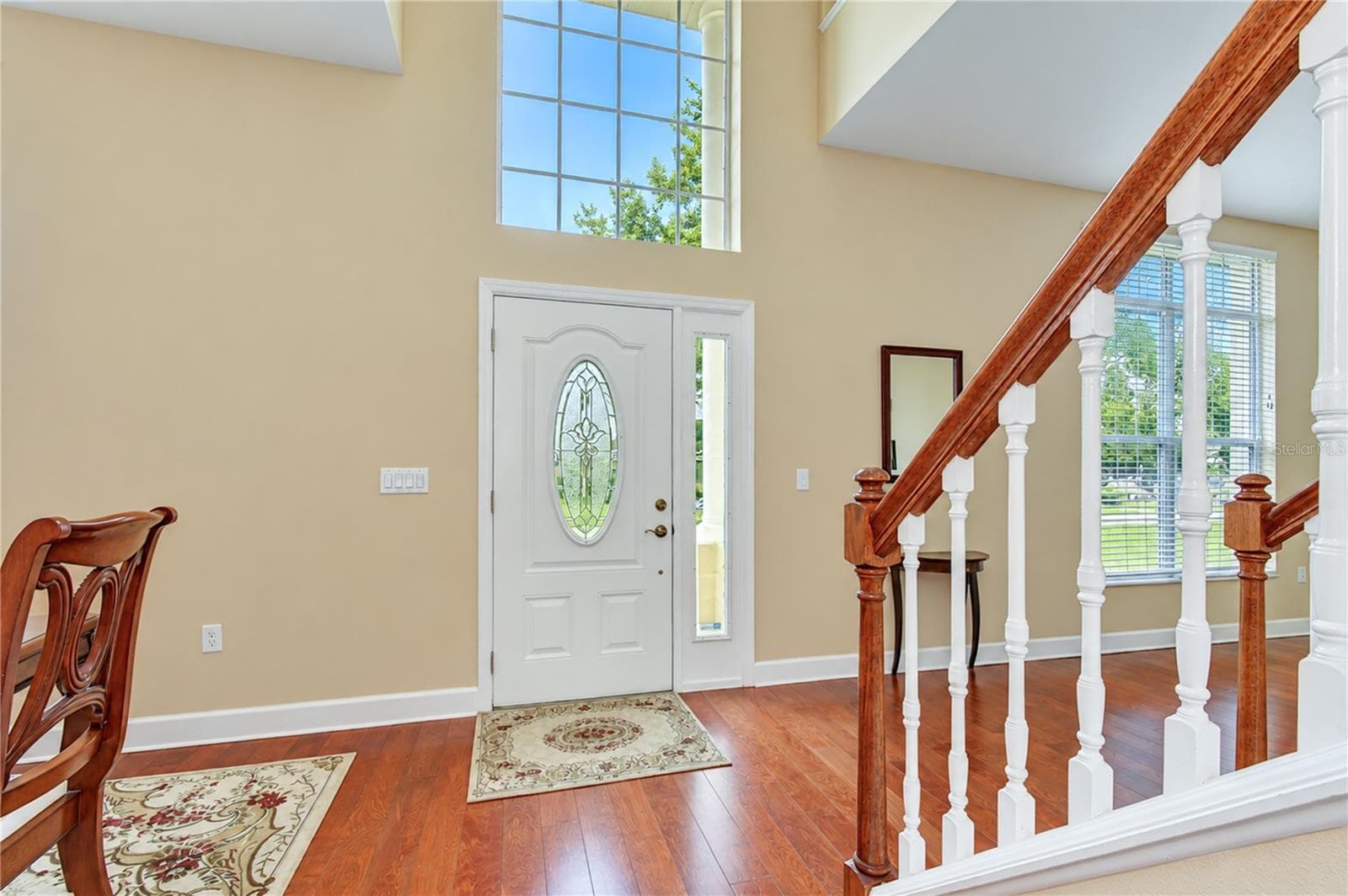 Bright and inviting interior with a spacious two-story layout. - 5104 WHISPERING LEAF TRL, VALRICO