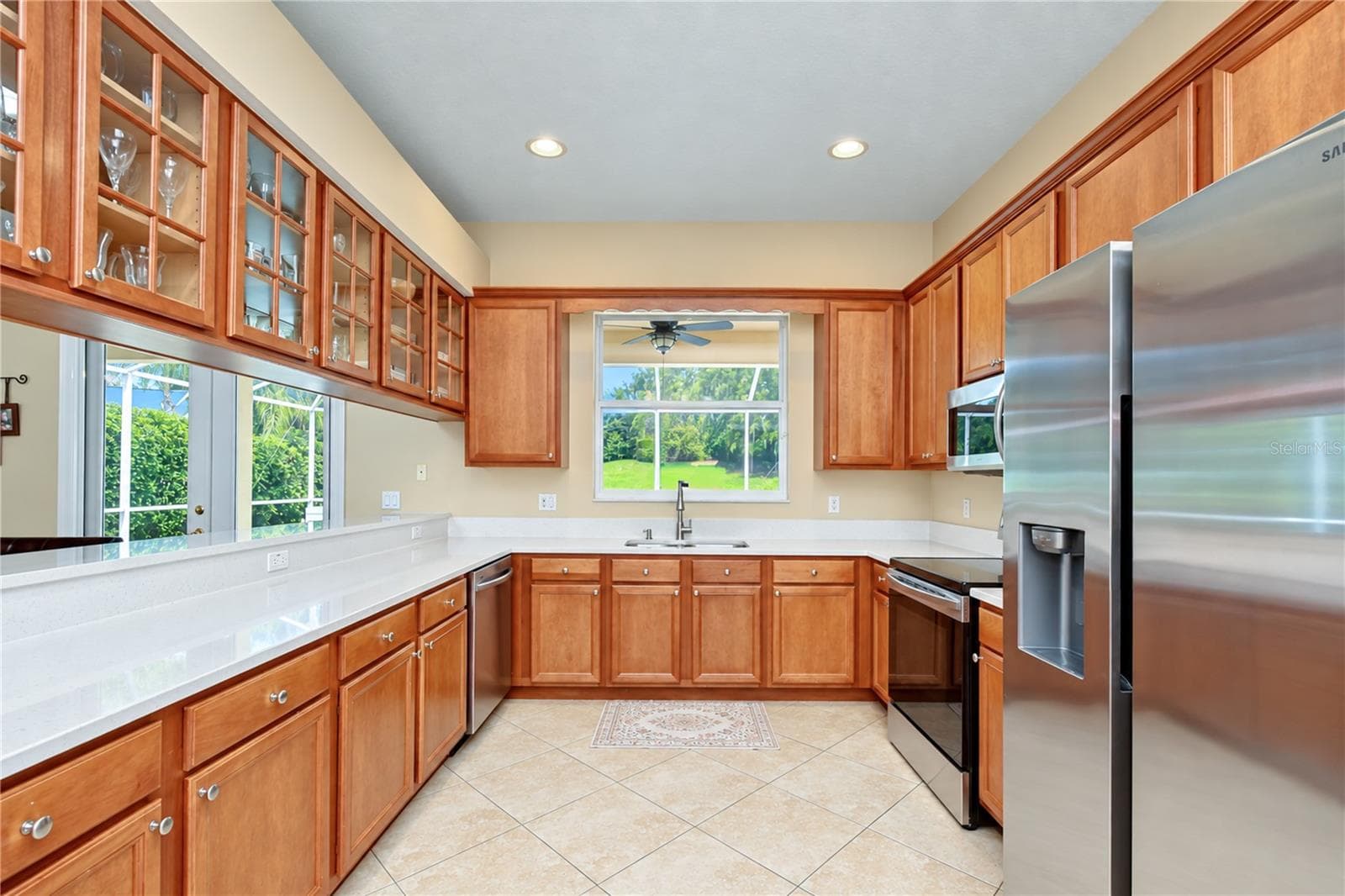 Abundant cabinetry to keep essentials organized. - 5104 WHISPERING LEAF TRL, VALRICO