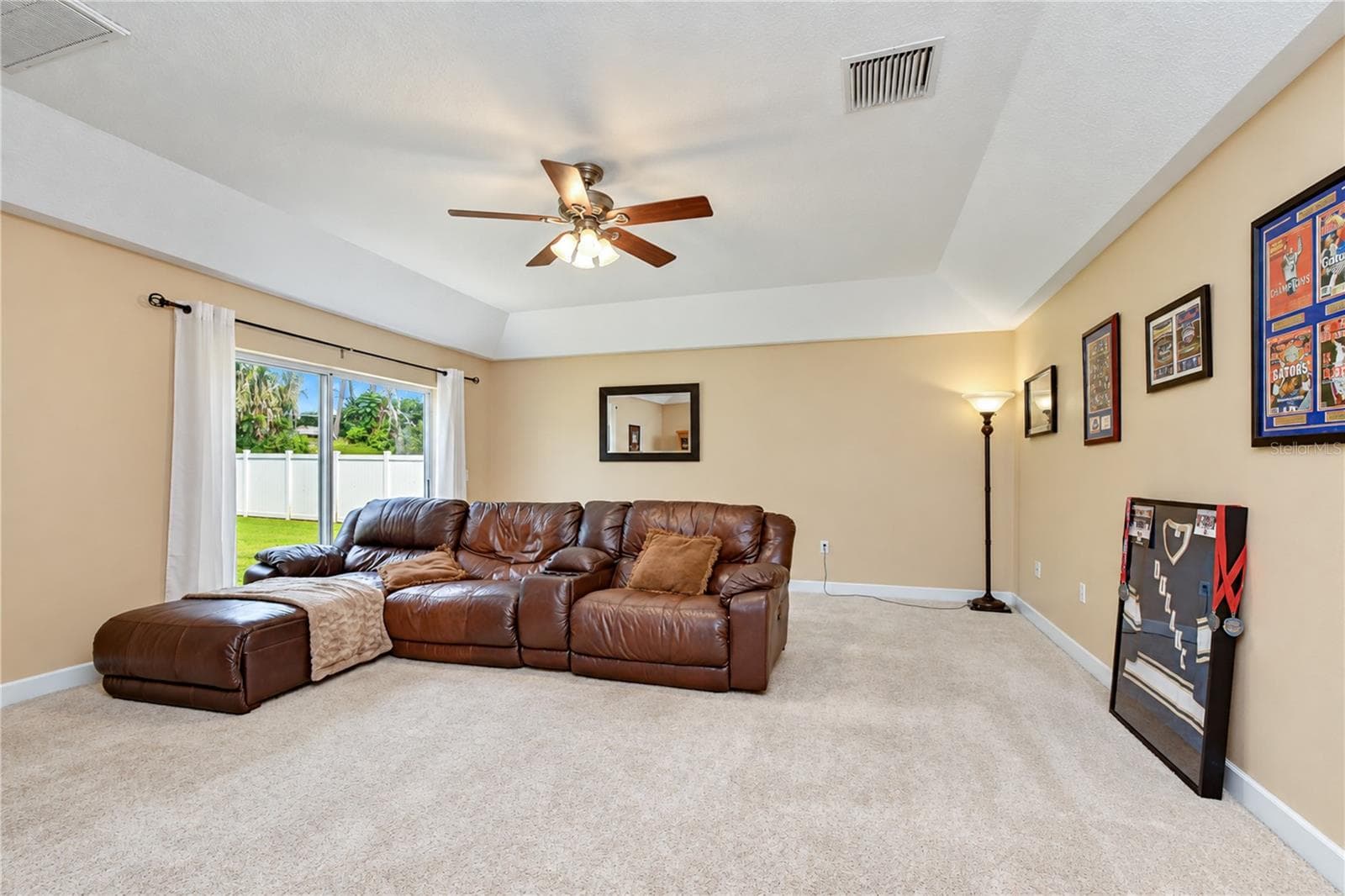 Versatile additional living area suited for a home office, media room, game room, or gym. - 5104 WHISPERING LEAF TRL, VALRICO