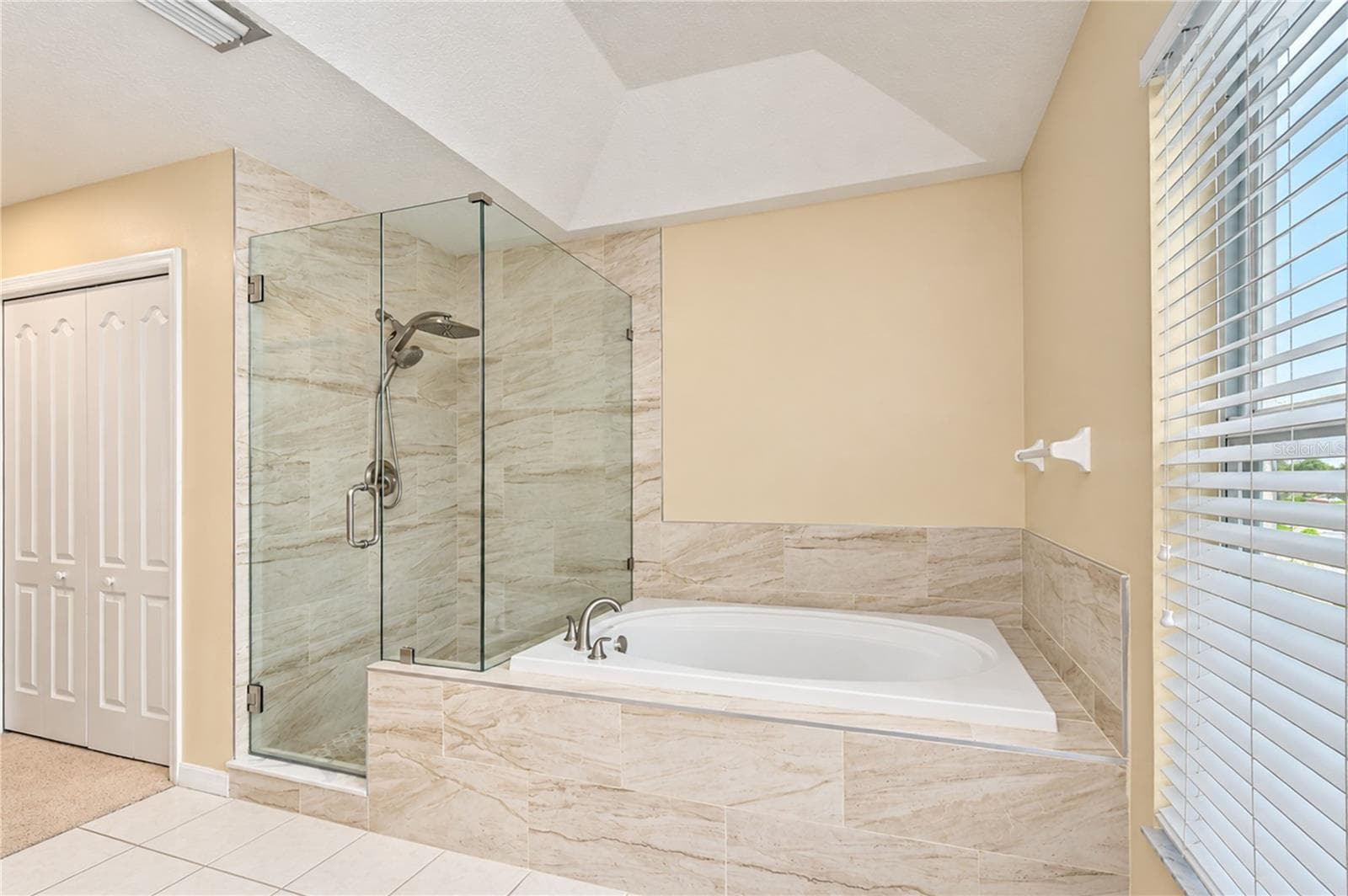Recent renovation brings a refreshed look to the primary suite. - 5104 WHISPERING LEAF TRL, VALRICO