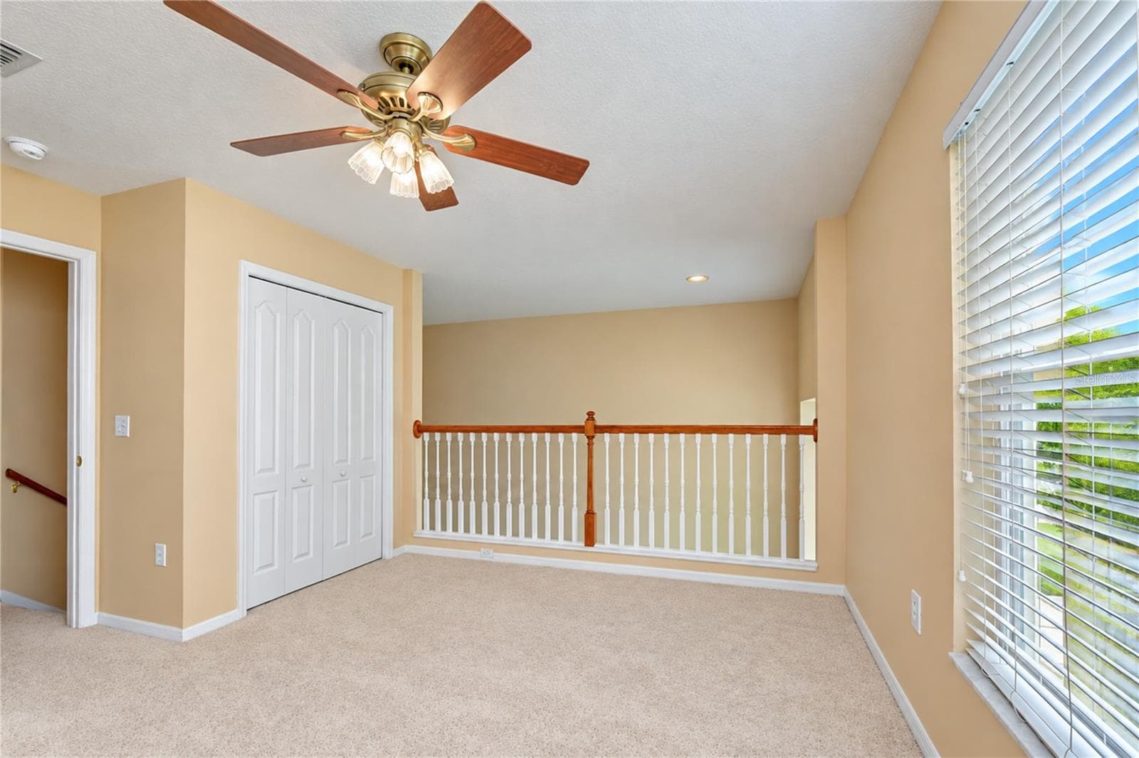 Two-story layout provides separation between main living spaces and bedrooms. - 5104 WHISPERING LEAF TRL, VALRICO
