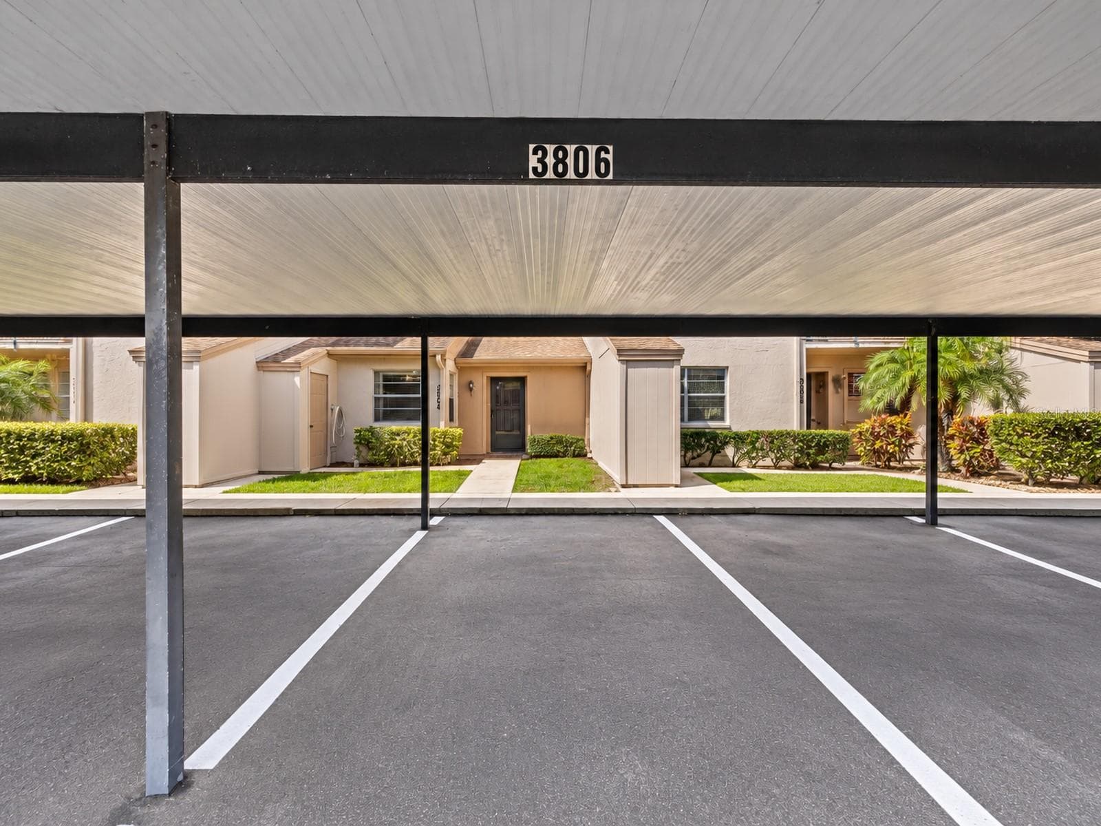 Designated Covered Parking Directly in Front of the Condo - 3806 STAYSAIL LN, HOLIDAY