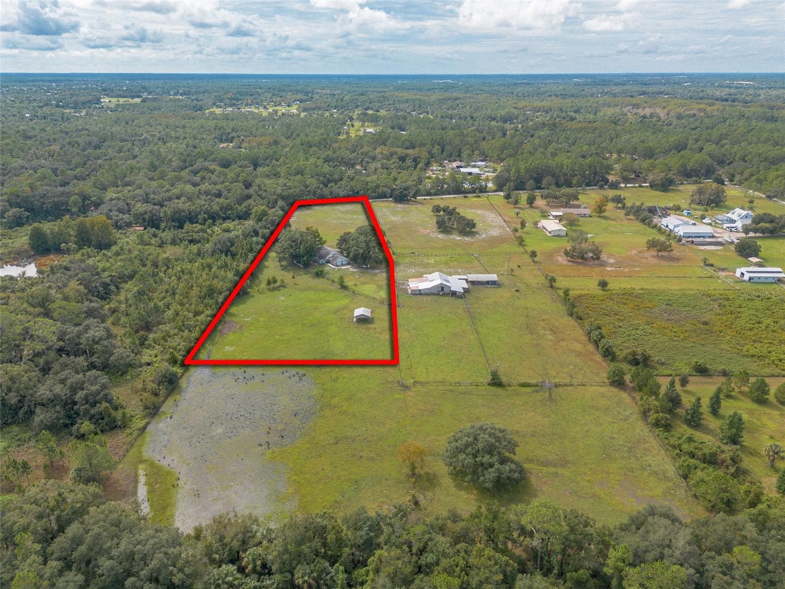 Property outlined in red - 1390 E OHIO AVE, LAKE HELEN