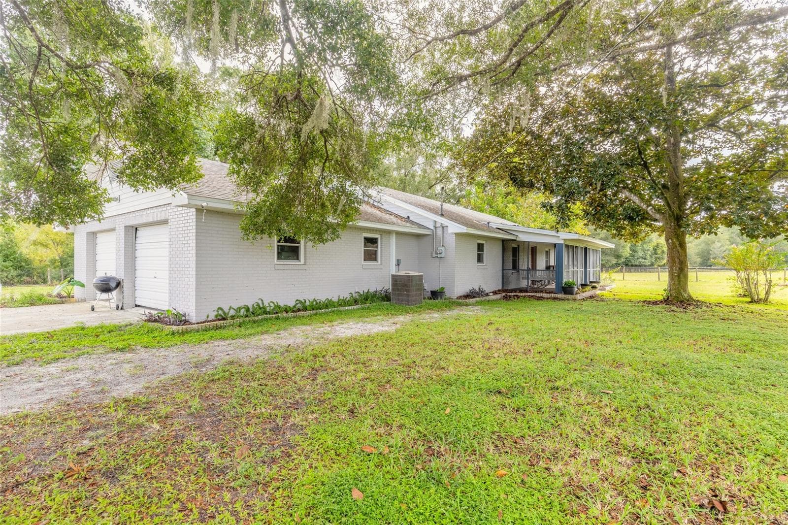 Side/front of home - 1390 E OHIO AVE, LAKE HELEN