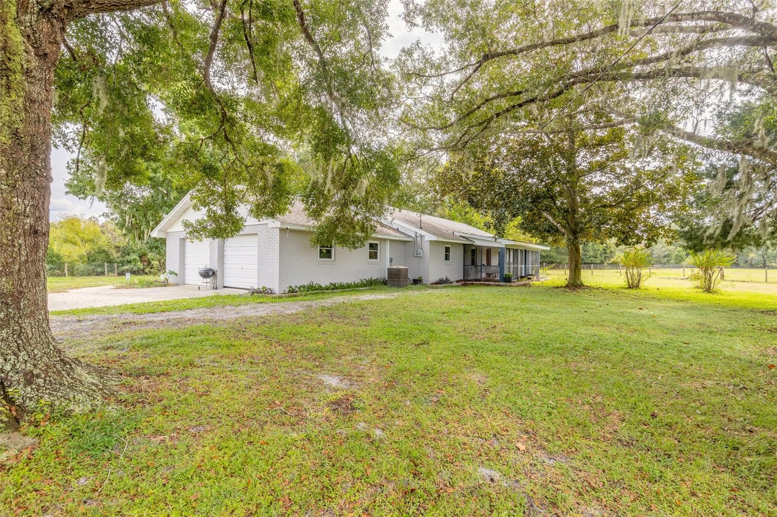 Side/front of home - 1390 E OHIO AVE, LAKE HELEN