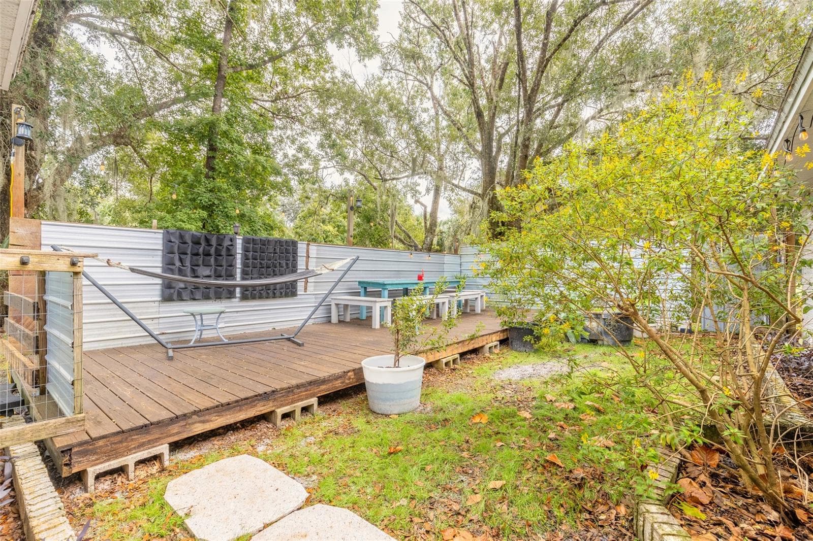 Portion of backyard fenced with deck - 1390 E OHIO AVE, LAKE HELEN