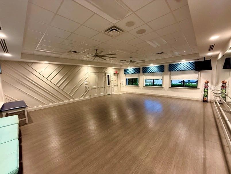 Studio with large storage that contains Pilates/gym weights and ping pong tables - 4923 PAMPLONA CT, WIMAUMA