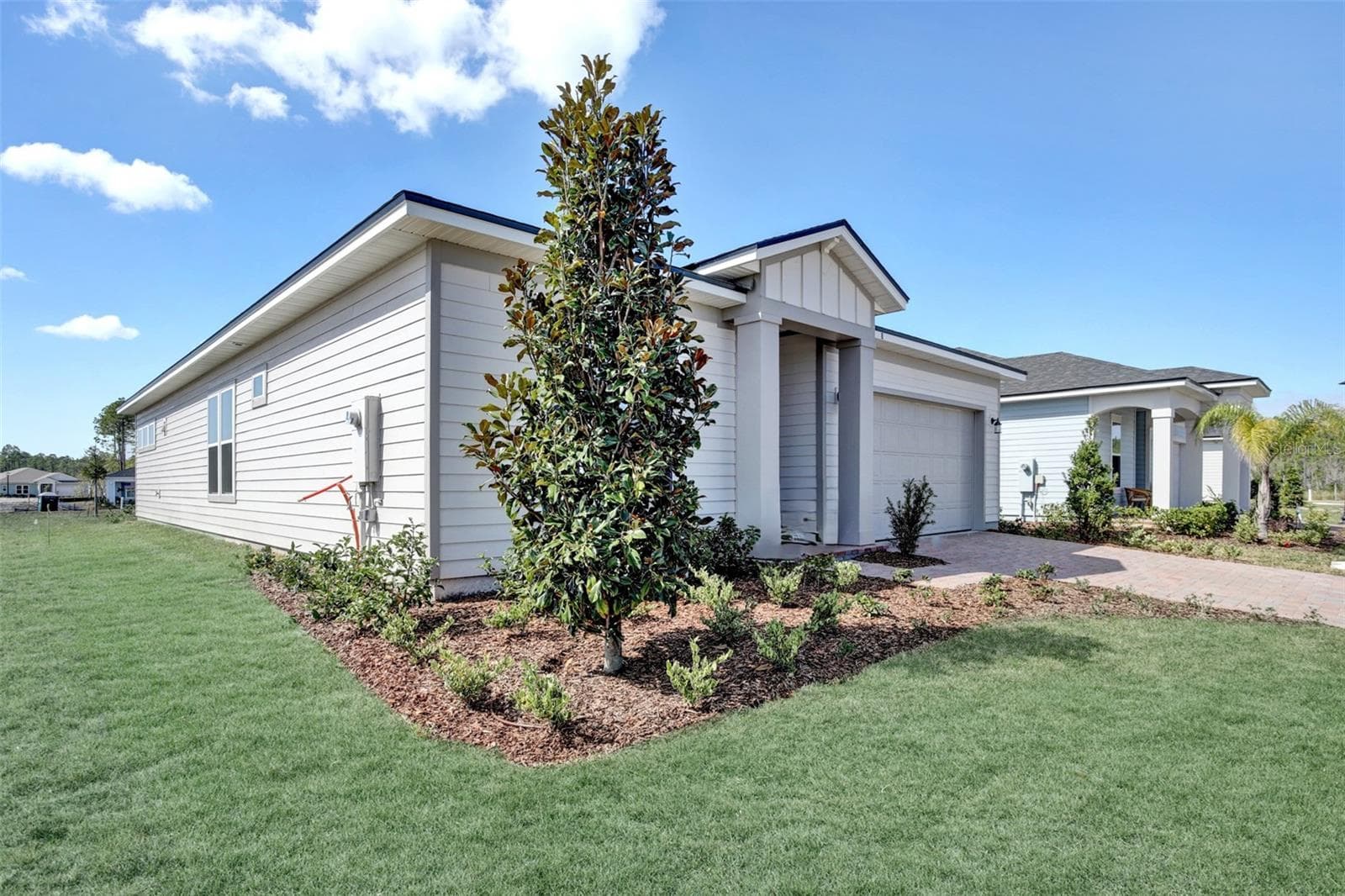 The sample photos included are of the model home and are meant to showcase the craftsmanship and design quality. - REVERIE AT PALM COAST, PALM COAST