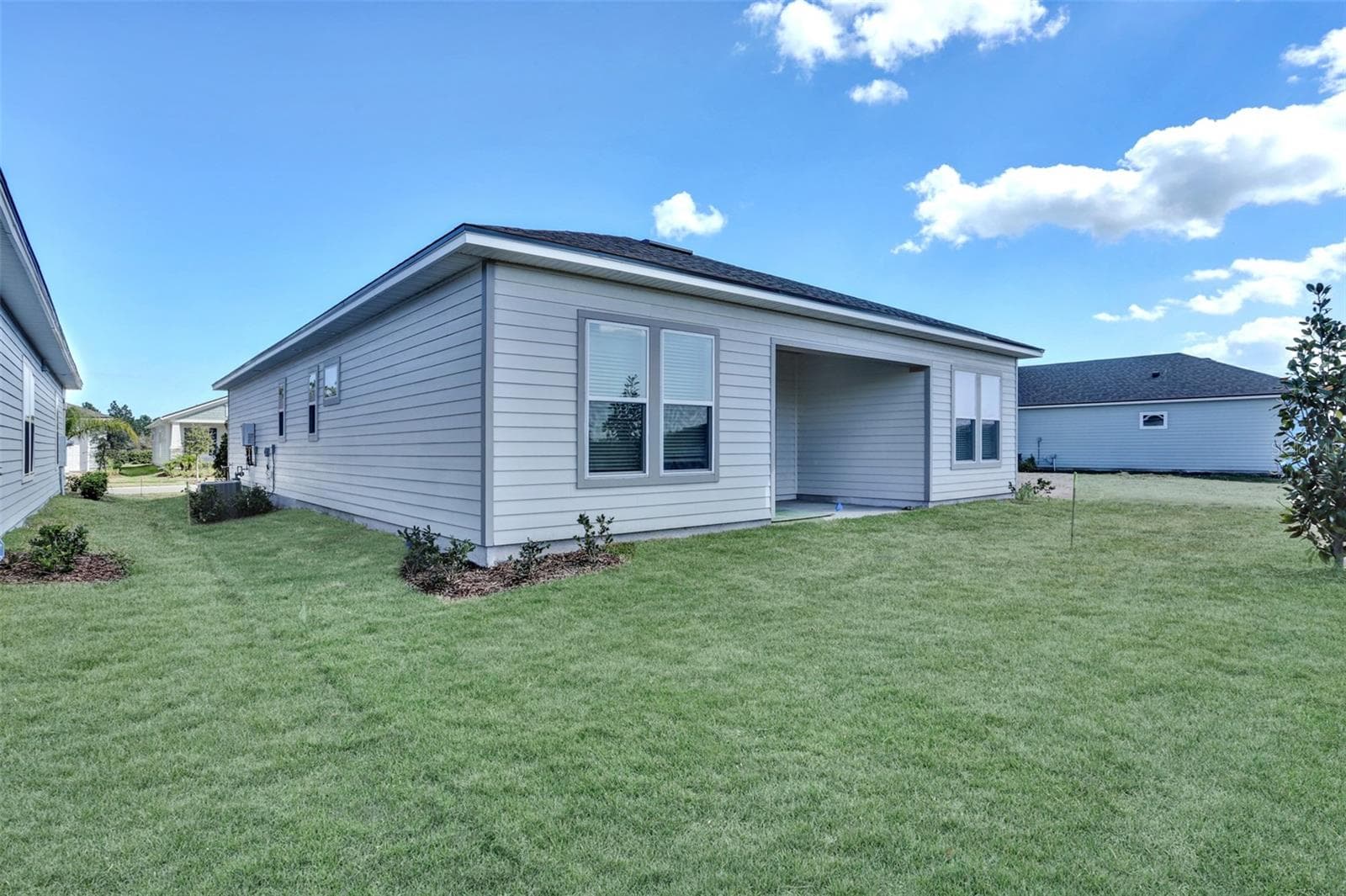 The sample photos included are of the model home and are meant to showcase the craftsmanship and design quality. - REVERIE AT PALM COAST, PALM COAST