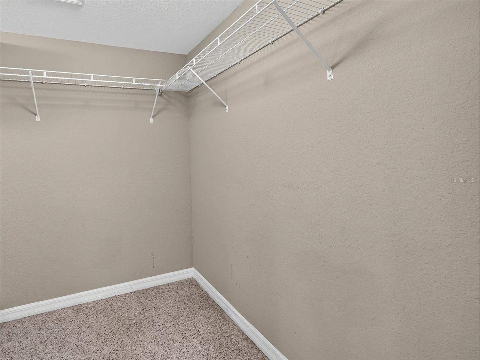 Primary Bdrm Walk-in closet - 601 SHREVE ST #66C, PUNTA GORDA