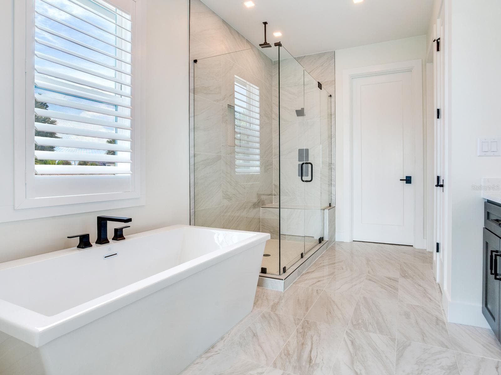 Picture of the bathroom of a SeaSafe Shore Crest home already built for reference purposes only. - 4 BELLEVUE DR, TREASURE ISLAND