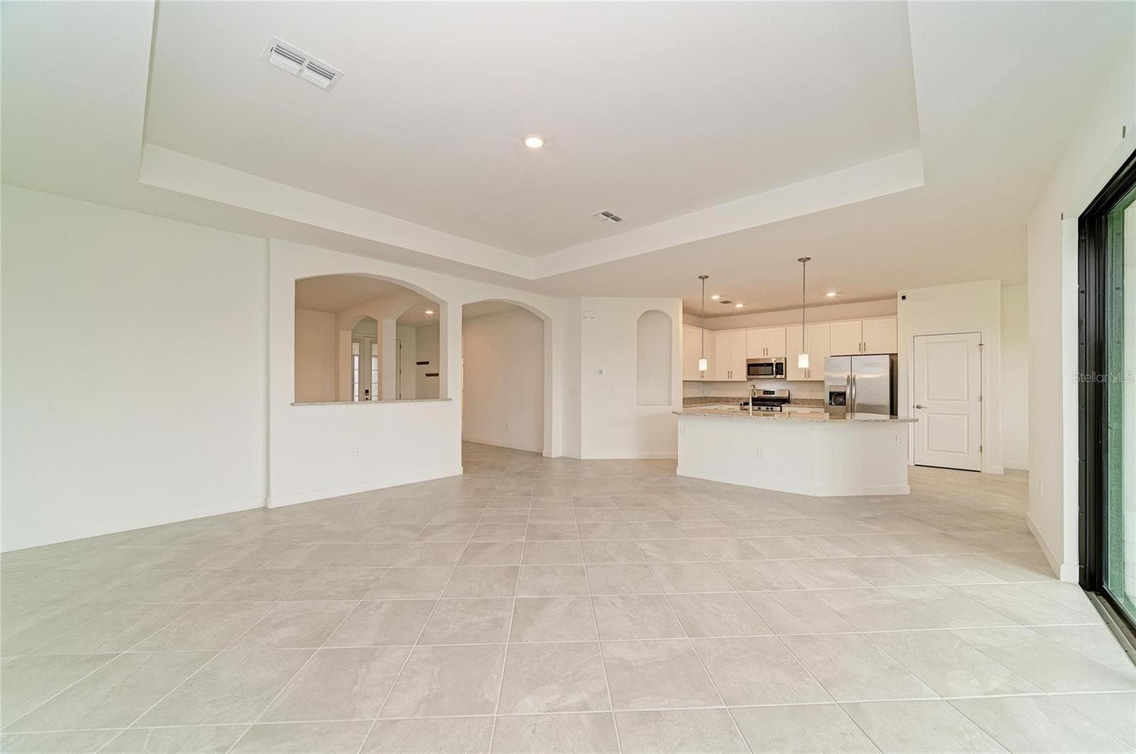 main living looking toward kitchen - 15332 SERENE SHORES LOOP, BRADENTON
