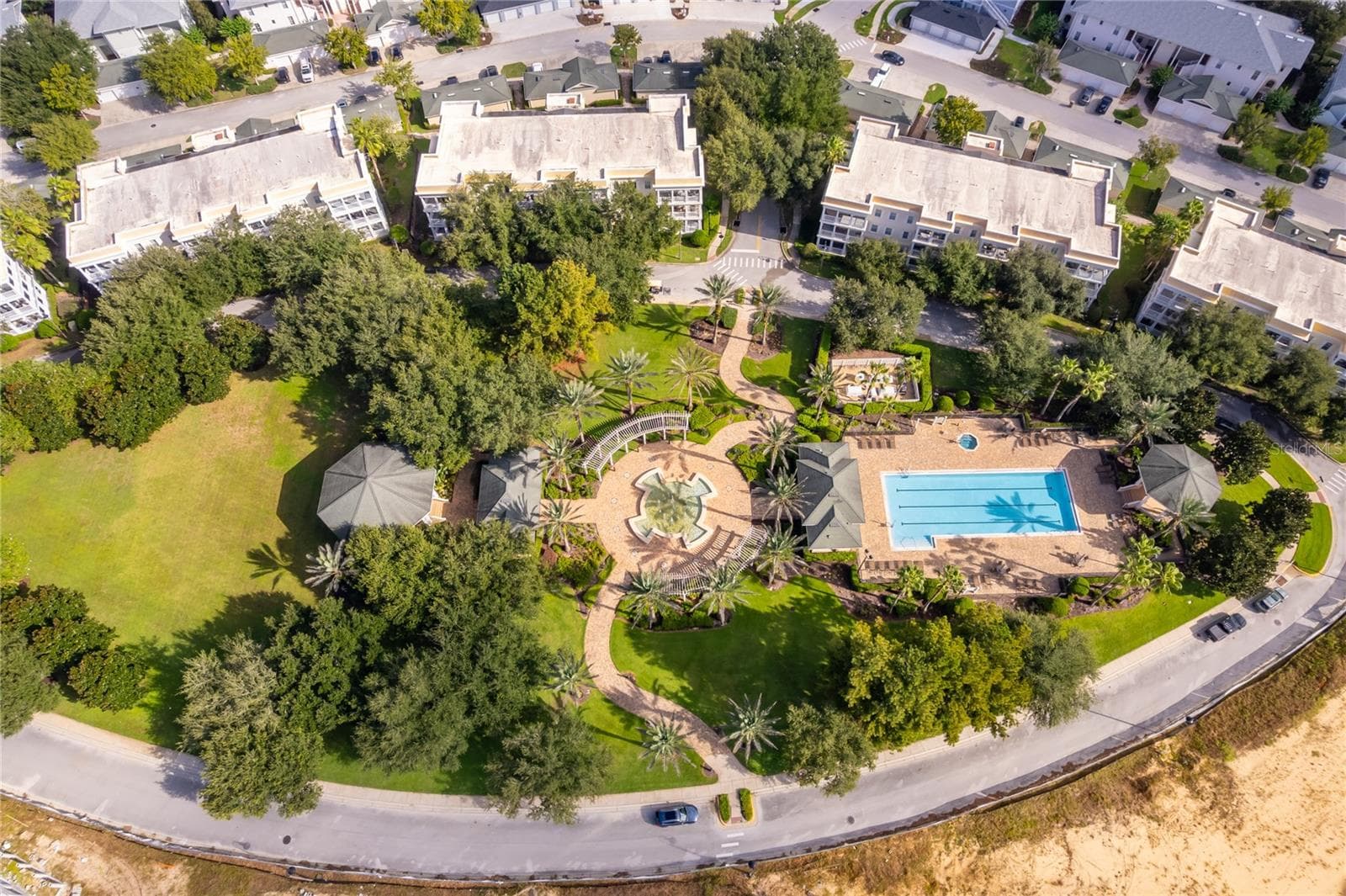 One of the many community pools - 7513 EXCITEMENT DR, KISSIMMEE