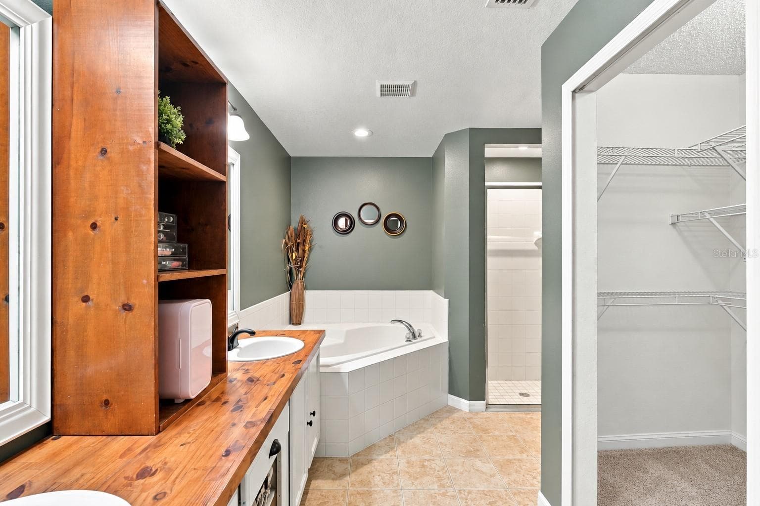 Primary bath - 210 CITATION AVE, DELTONA