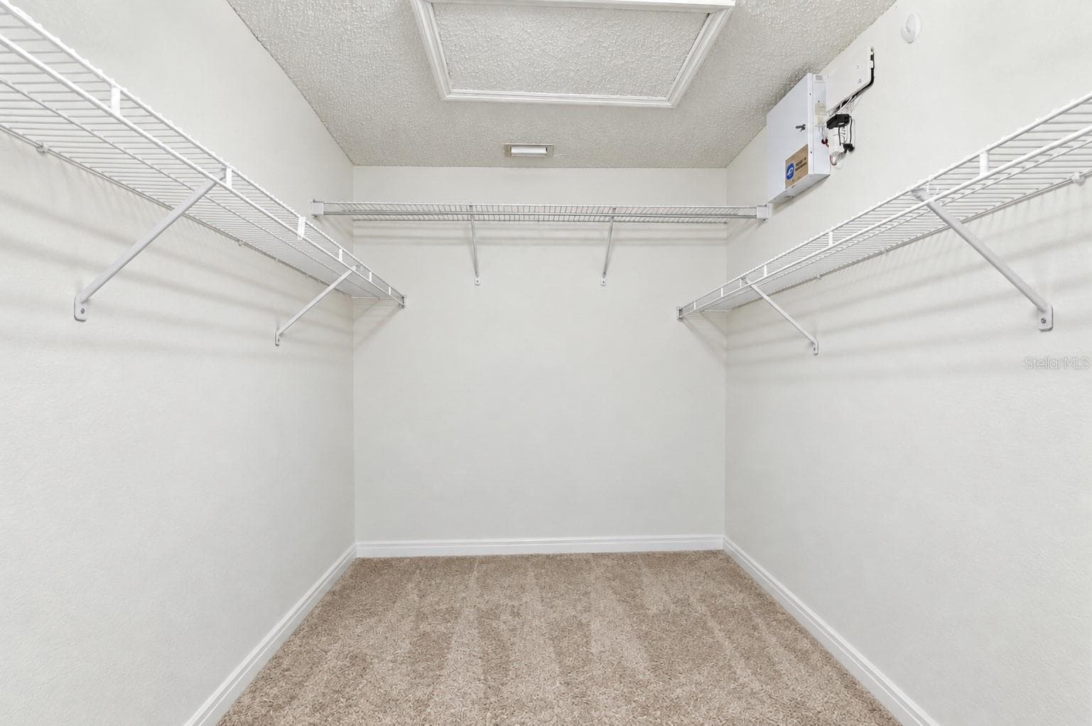 Primary closet - 210 CITATION AVE, DELTONA