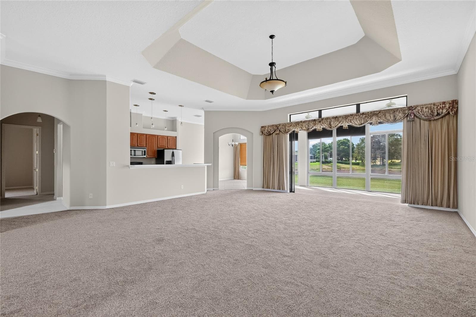 Living room with views of pond - 26717 WETLANDS WAY, LEESBURG