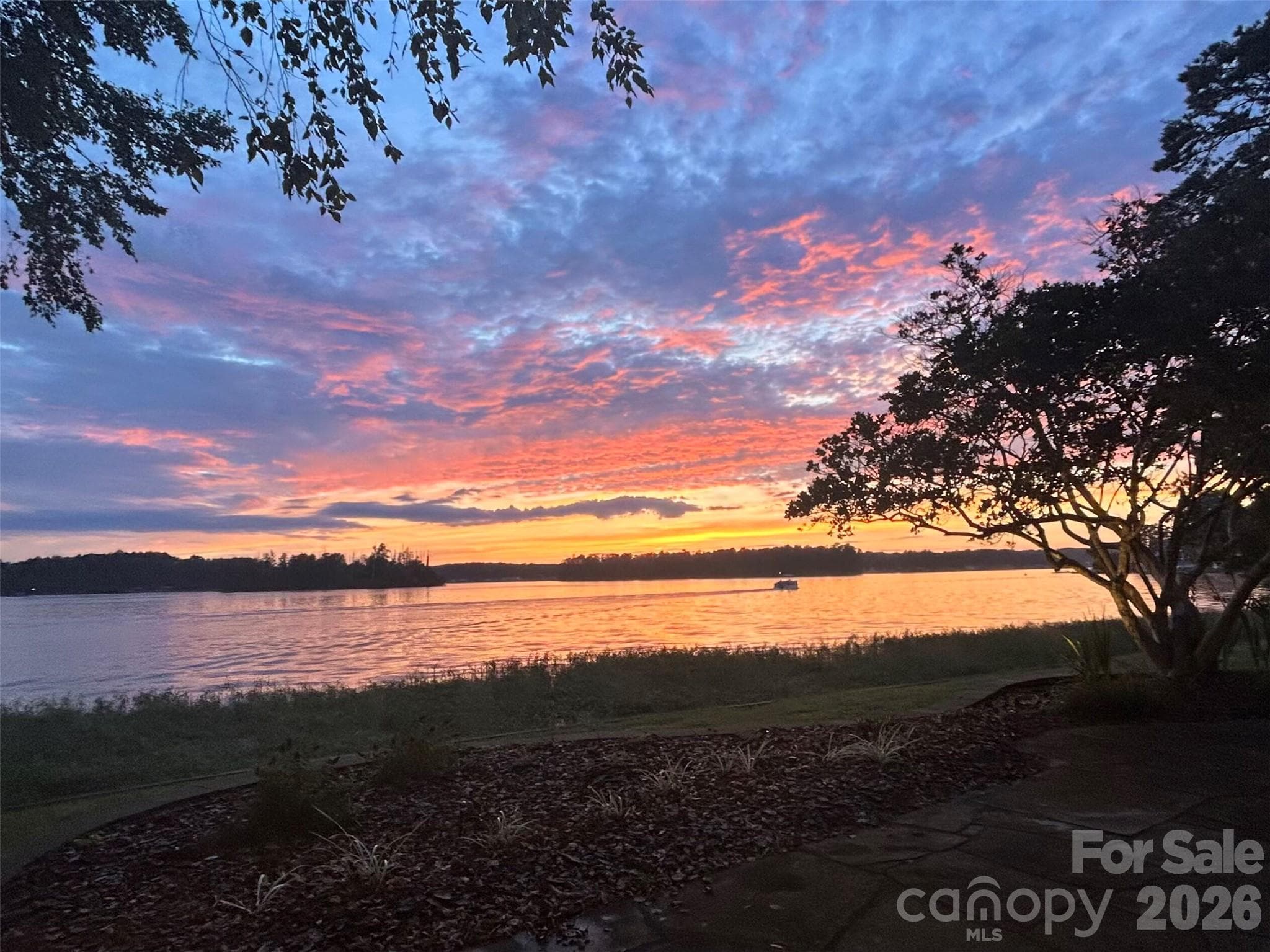 Sunset from the front yard. - 172 Rogers Lane, Badin Lake