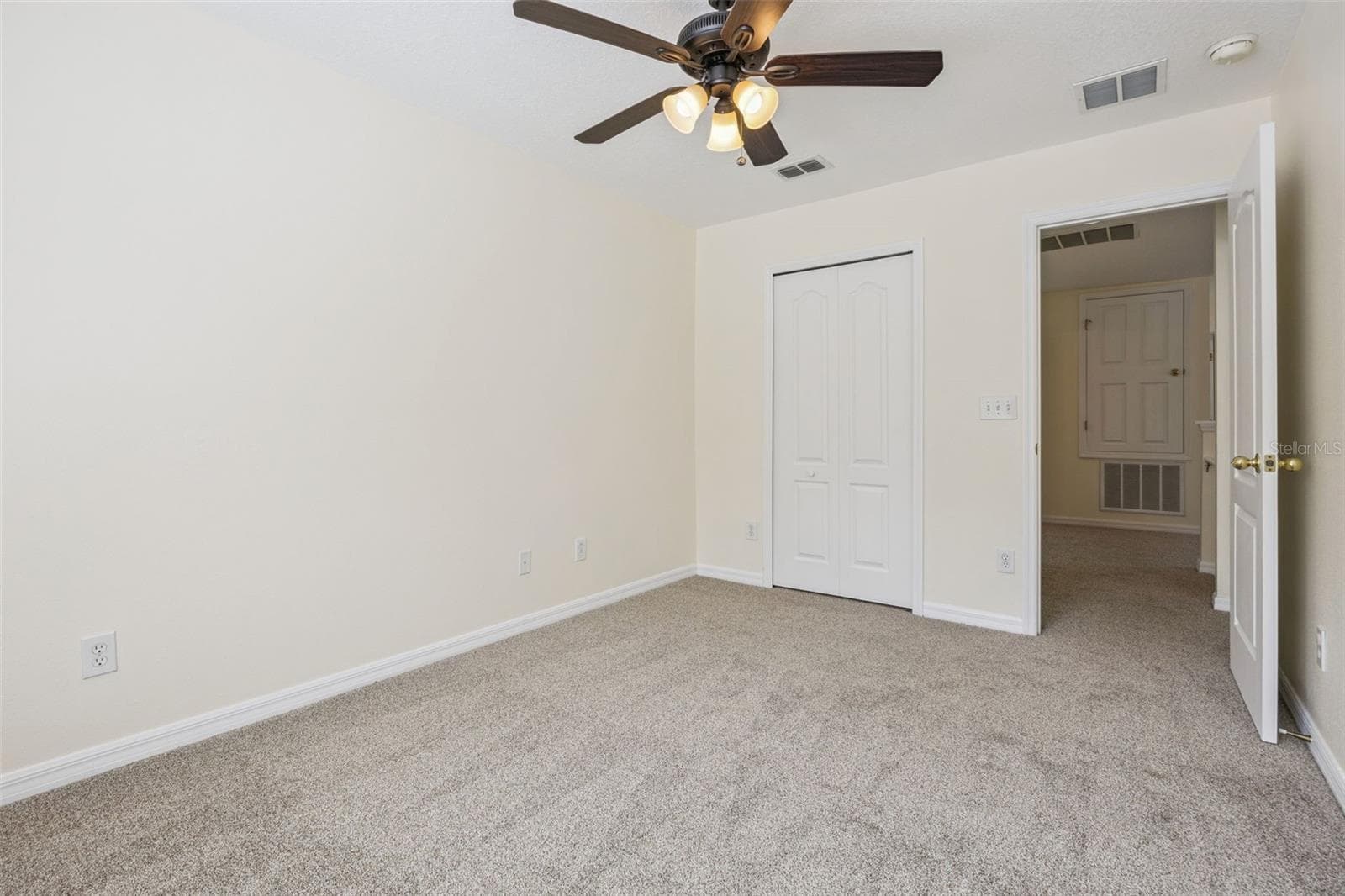 Bedroom 2 (9'8" x 12'9") with closet - 2020 PORTCASTLE CIR, WINTER GARDEN