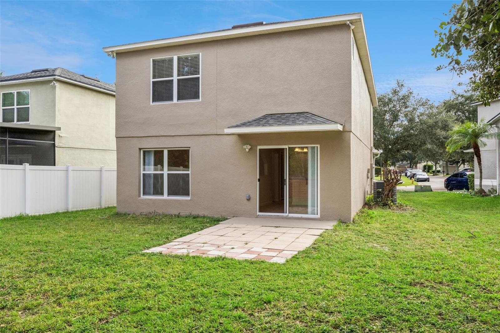 Rear patio and backyard - 2020 PORTCASTLE CIR, WINTER GARDEN