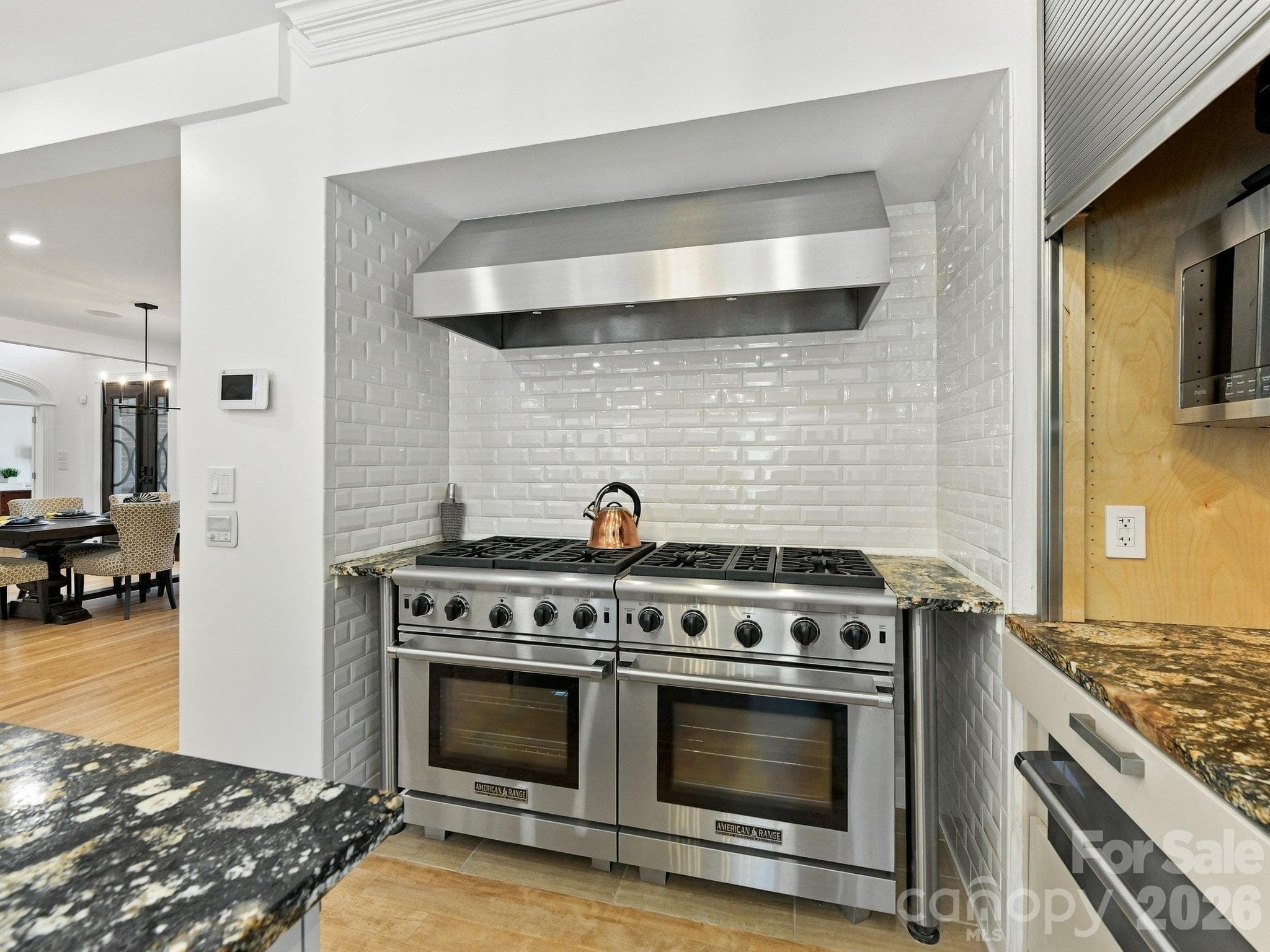 Dual professional gas ranges with a stainless Vent-A-Hood. - 2723 Providence Pine Lane, Charlotte