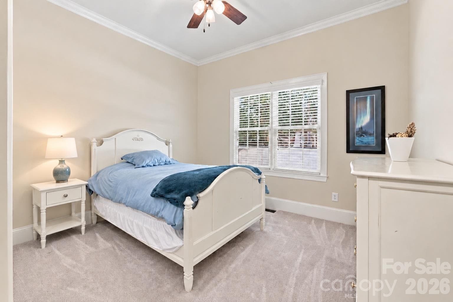 Bedroom suite with adjoining bath on the home's main floor. Ideal for anyone who has trouble navigating stairs. - 2309 Highland Forest Drive, Waxhaw