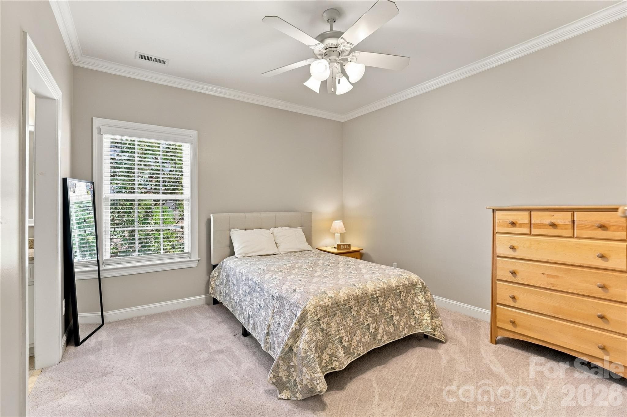 One of four additional bedrooms on the home's second floor features en-suite access to a Jack & Jill bathroom. - 2309 Highland Forest Drive, Waxhaw