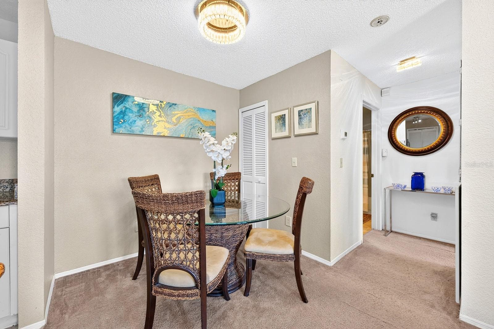 The Dining Room is a welcoming space for everyday meals or gatherings. - 2550 N ALAFAYA TRL #6303, ORLANDO
