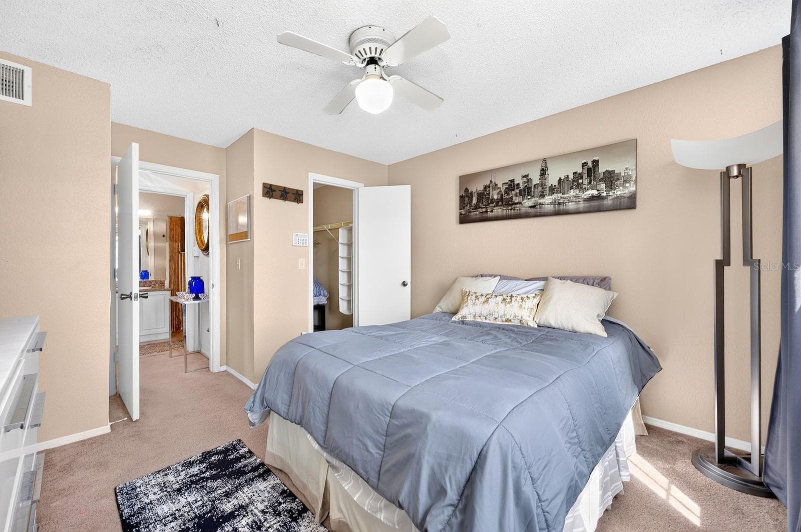 The GENEROUS WALK-IN CLOSET in the Bedroom provides plenty of storage. - 2550 N ALAFAYA TRL #6303, ORLANDO