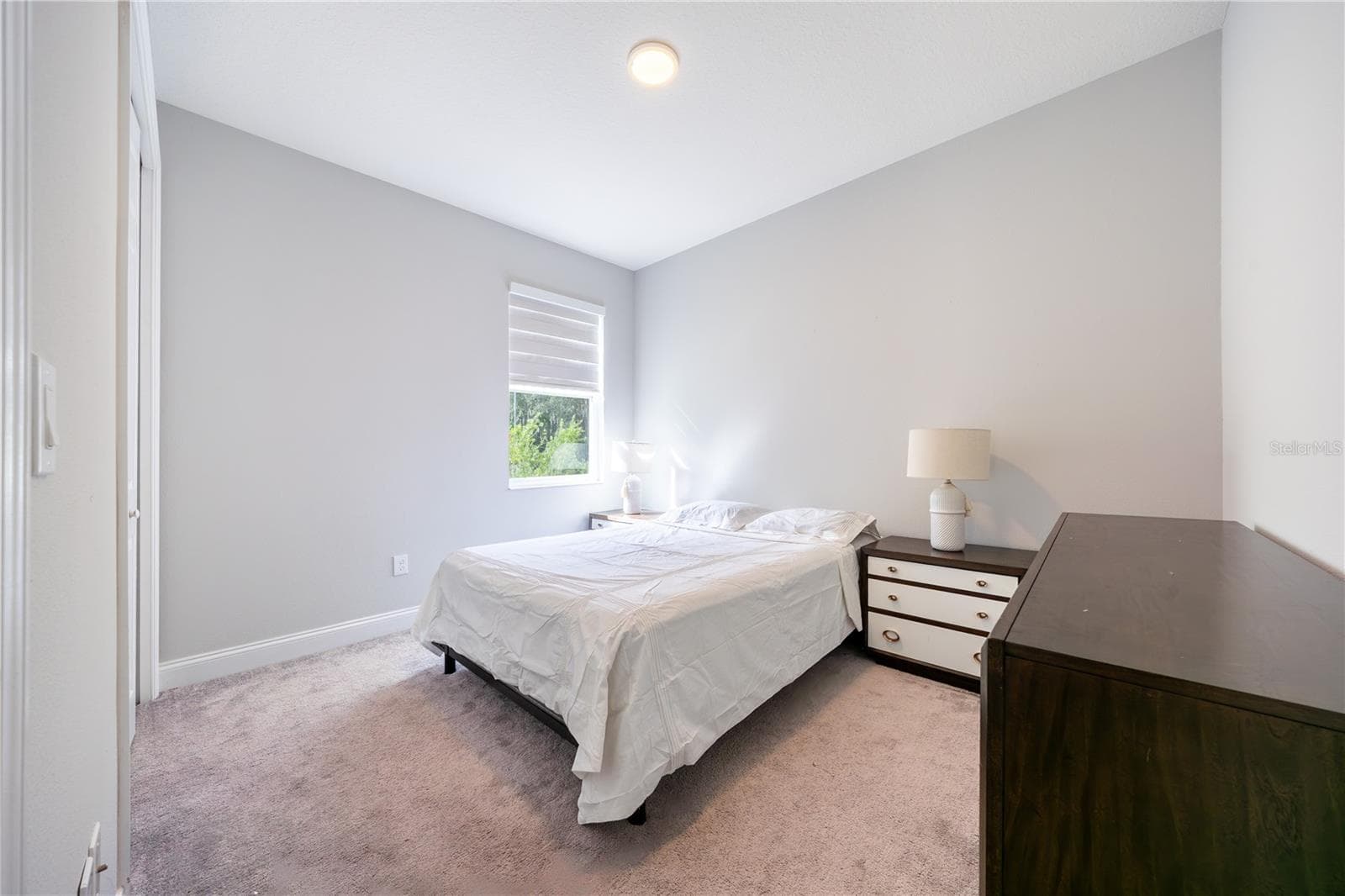 Comfortable bedroom with soft carpeting and a soothing neutral palette. - 1316 SOUTHERN SUN DRIVE, OAKLAND