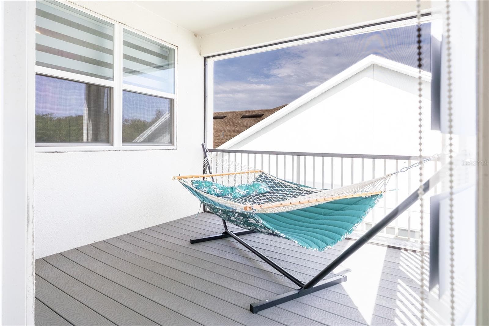 Covered upstairs balcony overlooking a conservation area, ideal for relaxing. - 1316 SOUTHERN SUN DRIVE, OAKLAND