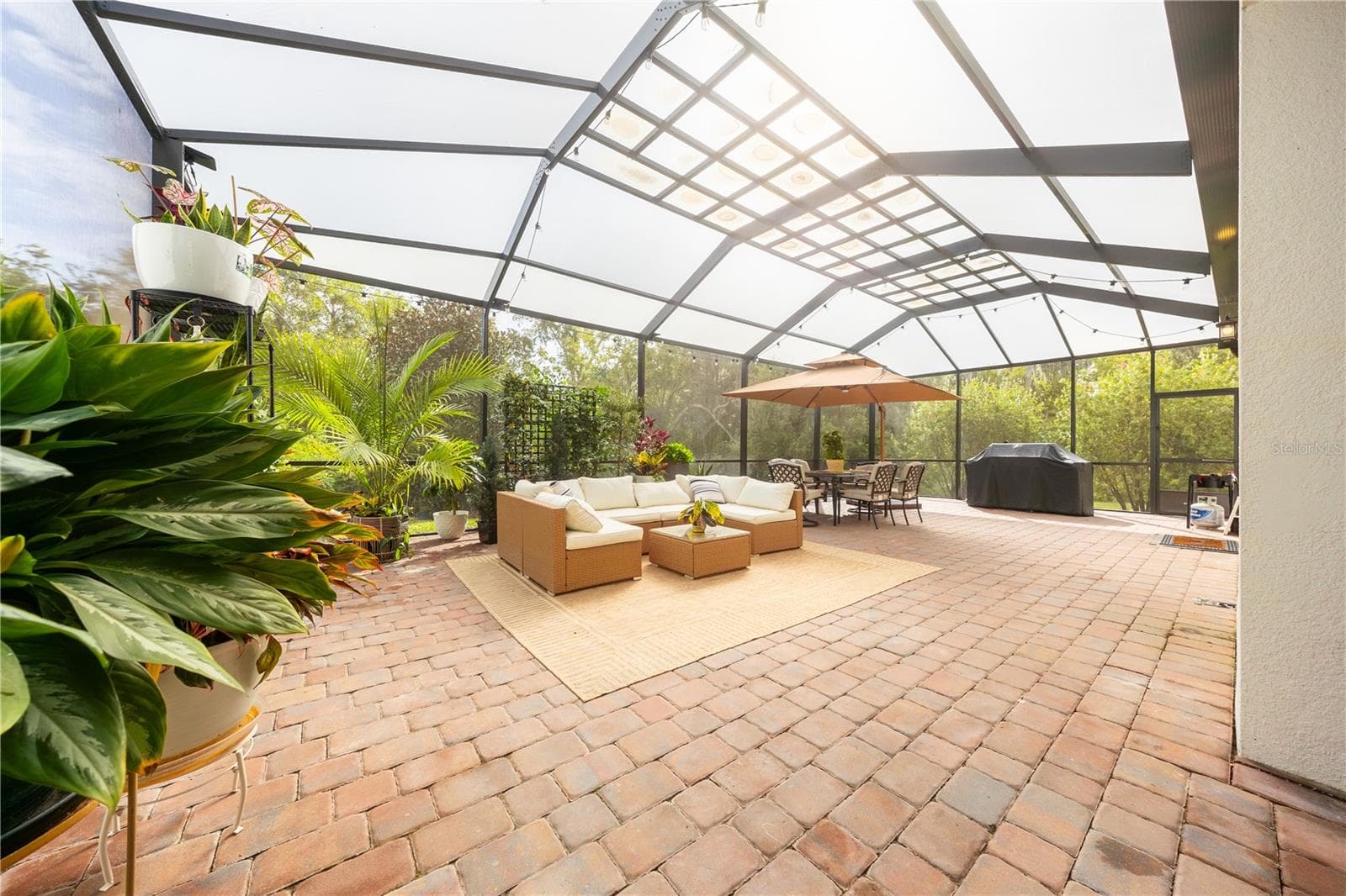 Expansive screened patio with conservation views and potential for a custom pool, - 1316 SOUTHERN SUN DRIVE, OAKLAND