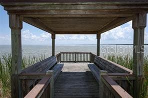 Covered lakeside gazebo, ideal for enjoying sunrises and capturing beautiful photos. - 1316 SOUTHERN SUN DRIVE, OAKLAND
